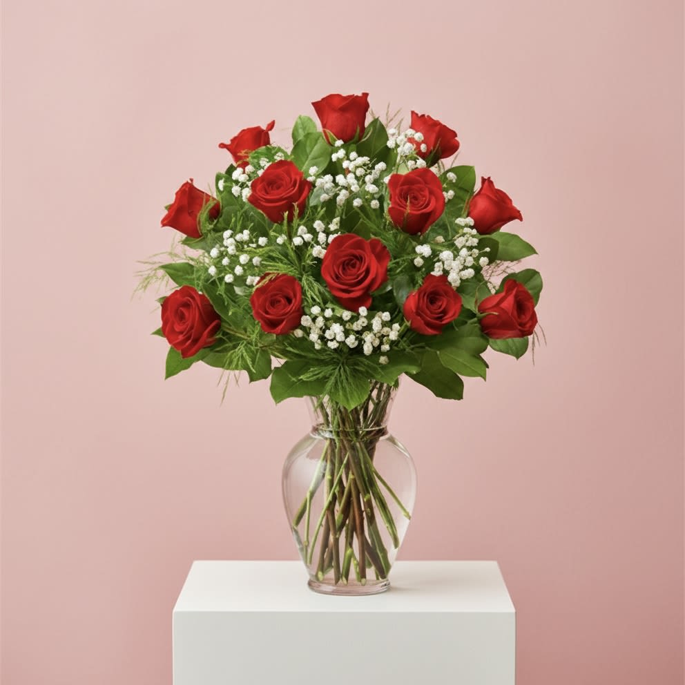 Classic Roses - One dozen red roses arranged beautifully with baby's breath and greenery in a classic glass vase