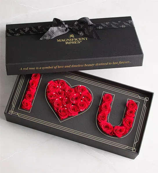I LOVE YOU - Our genuine red roses are selected for their size and perfection  arranged to spell out “I Heart U.” Sparkling crystal accents and a sleek black sentiment gift box add to the glamour, creating a Valentine’s, birthday, anniversary to surprise like no other.