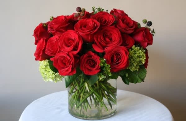 Modern Red Roses  - 24 Red Roses in a modern vase designed low and stylish.