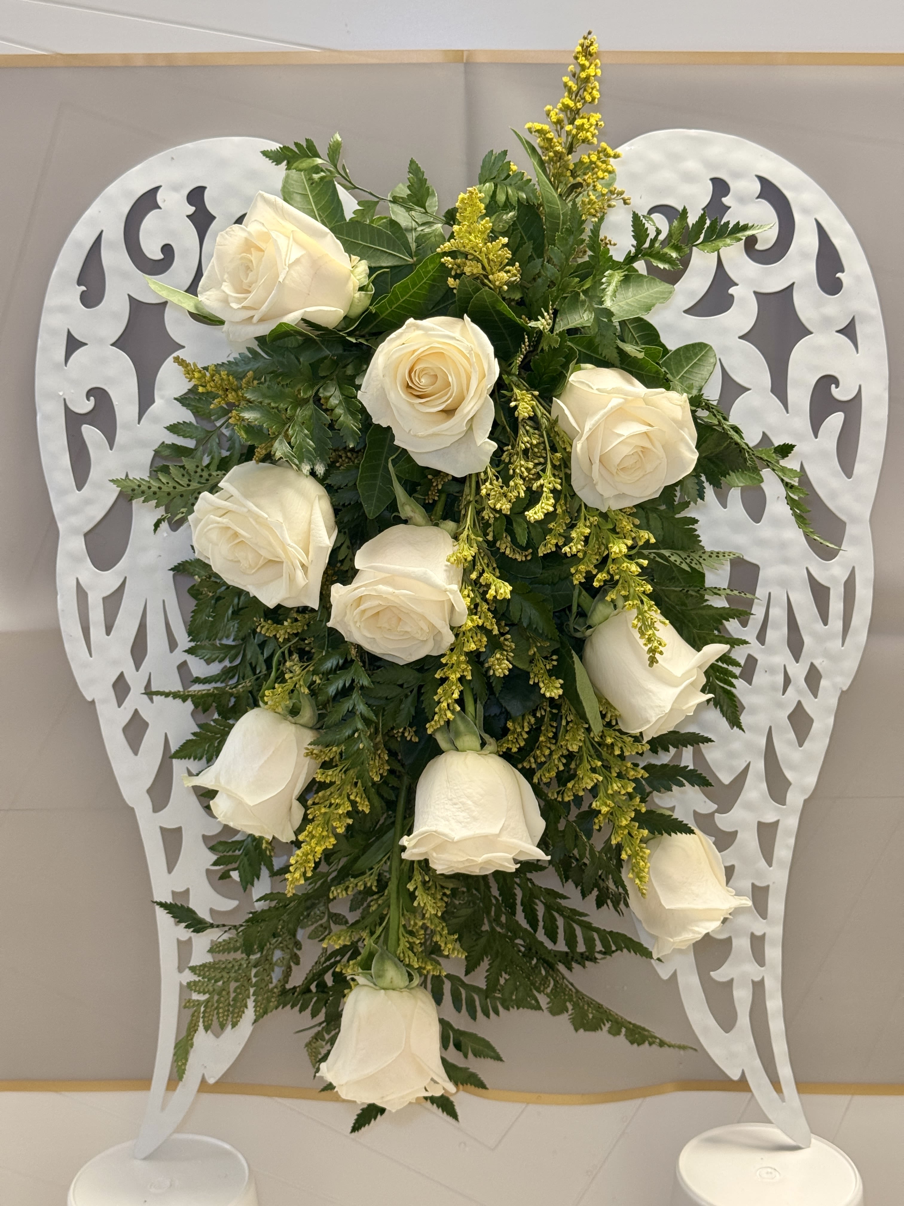 Beloved angel  - A timeless arrangement crafted in white blooms, symbolizing peace, elegance, and heartfelt sentiment. Perfect for any occasion.