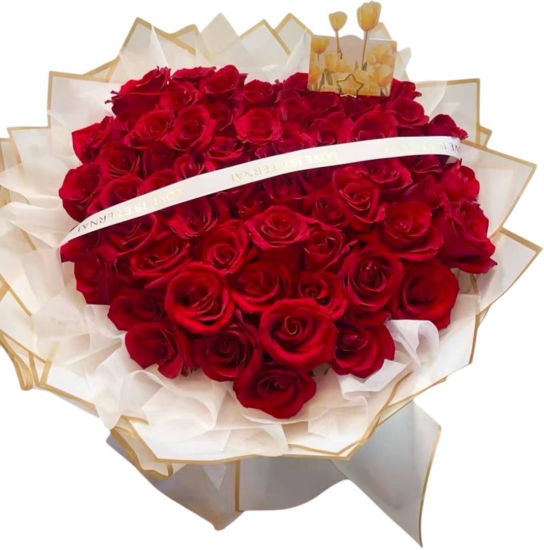 Queen’s Treasure - The Queen’s Treasure bouquet is a stunning arrangement of premium red roses, carefully gathered into a luxurious round shape and crowned with elegance. Wrapped in delicate white and gold-trimmed paper, this bouquet symbolizes eternal love, passion, and devotion. The golden crown accent at the top adds a royal touch, making it the perfect gift for anniversaries, proposals, birthdays, or any moment when you want her to feel like a queen.