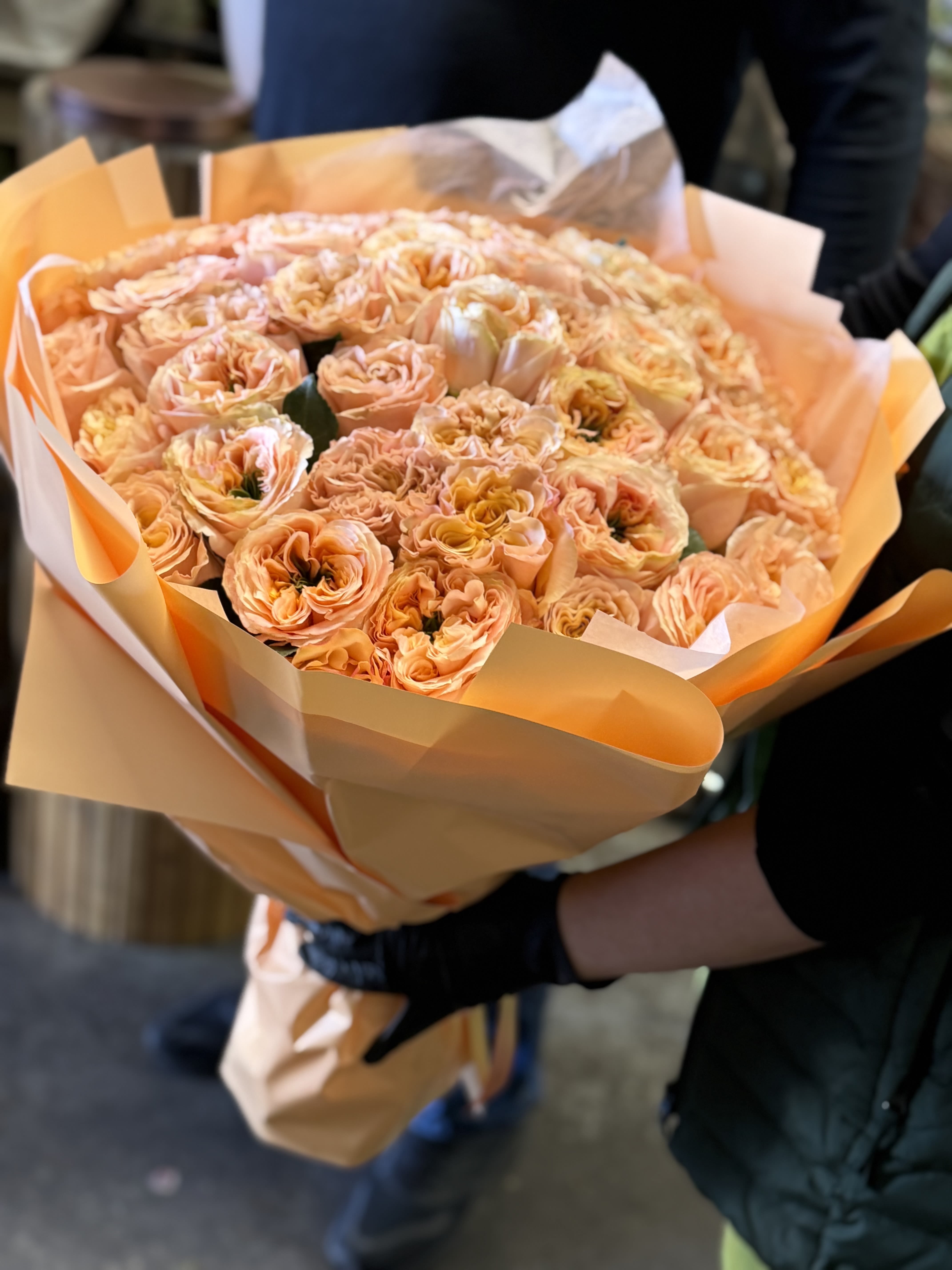 50 melon expression rose bouquet  - 50 stems of our most beautiful rose called melon expression wrapped in a gorgeous bouquet. 