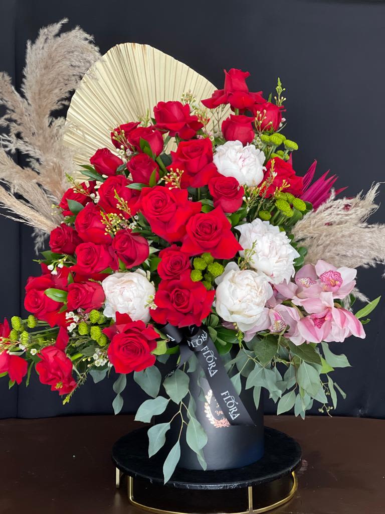 Mixed Floral Arrangement - Brighten any space with a beautiful mixed floral arrangement, featuring a vibrant blend of fresh seasonal flowers. Expertly designed for any occasion, this stunning bouquet combines colors and textures to create a lively and elegant display. Perfect for celebrations, gifts, or home decor, it’s sure to bring joy and charm to any room.