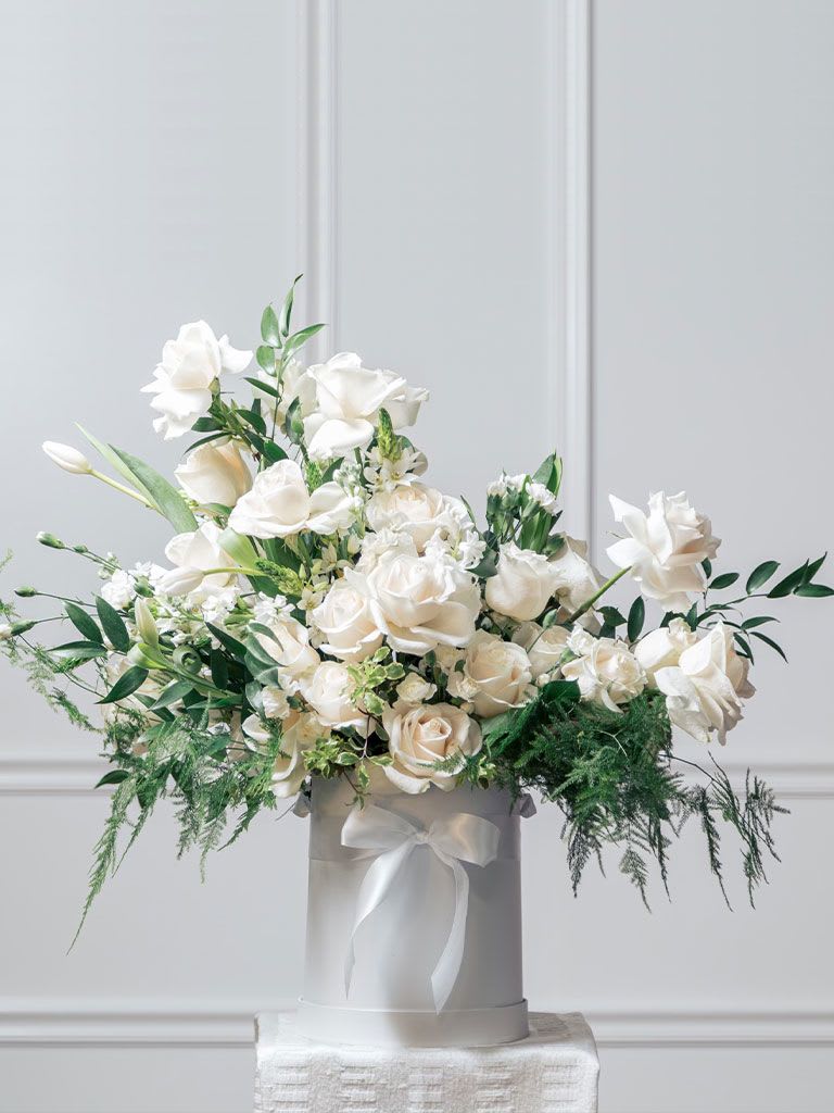 White Box with White Flowers – Elegant Gift &amp; Decoration for Special Occasions - Add a touch of elegance with our White Box filled with pure white flowers. Perfect for weddings, anniversaries, or any special occasion, this classic and timeless arrangement makes a stunning gift or centerpiece. Shop now to create a serene and beautiful atmosphere for your celebration!