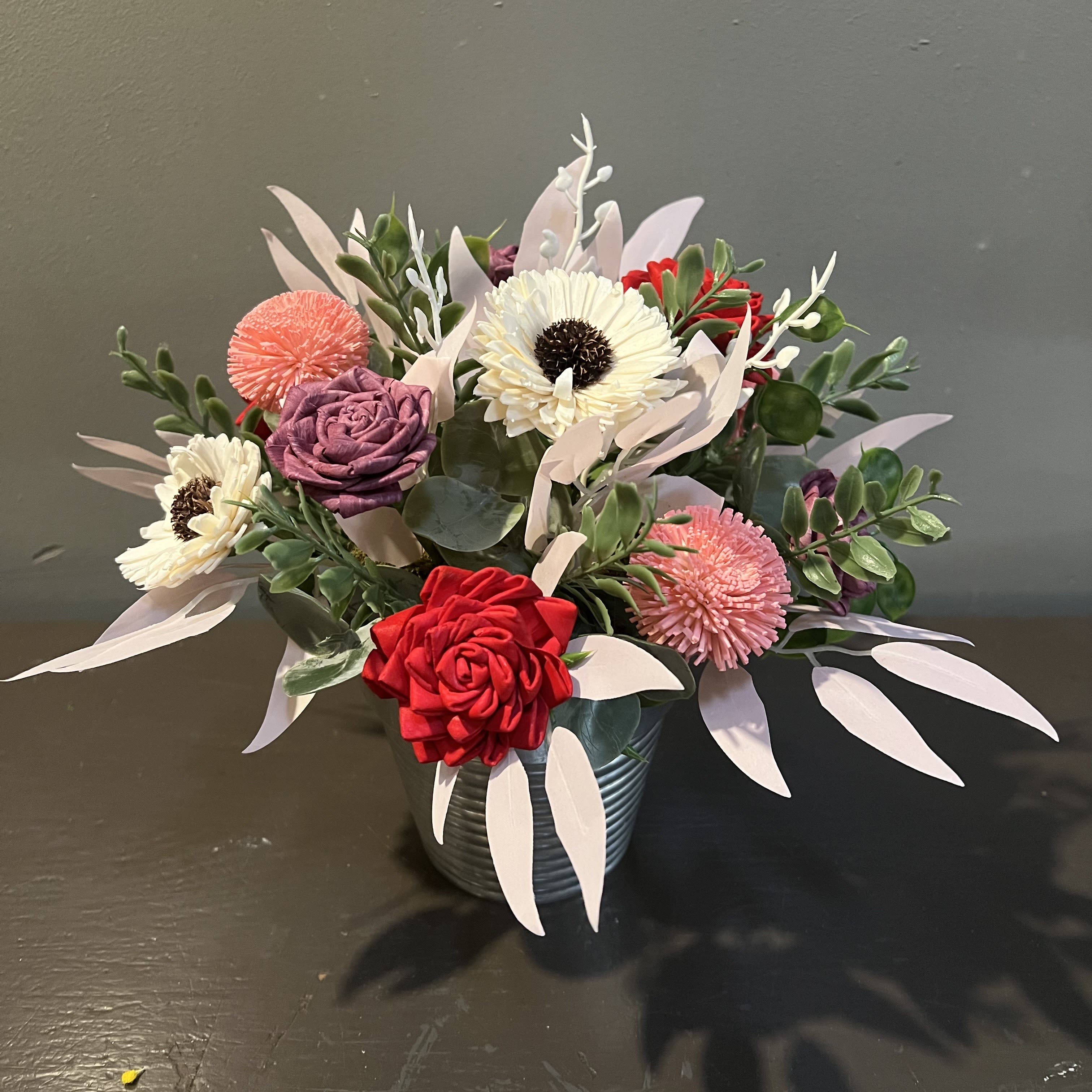 Sola Wooden Flower Centerpiece - Pink Posy - Hand-dyed and hand-crafted in Minneapolis, these flowers made of balsa wood are a wonderful everlasting floral arrangement - great for those with allergies! Can be used as a natural essential oil diffuser too! Arrives in a silver keepsake vase. Approx. Dimensions: 11"Wx11"T