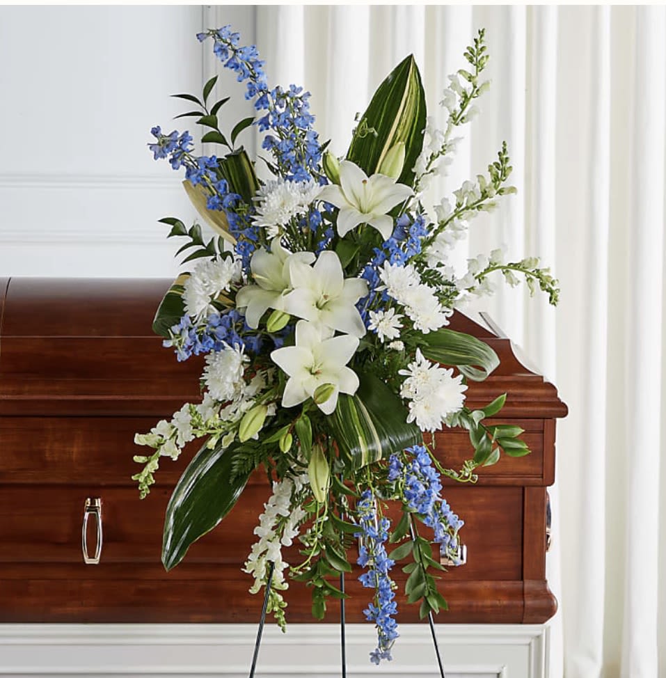 Eternal Impressions - Serving as a timeless tribute to honor and celebrate the life of a loved one, this exquisite standing spray features a combination of soft florals symbolic of everlasting love.   SUBSTITUTION POLICY Always deliver the freshest flowers! Please note the bouquet pictured reflects our original design.  If the exact flowers or container in this arrangement are not available, our local florists will create a beautiful bouquet with the freshest available flowers.