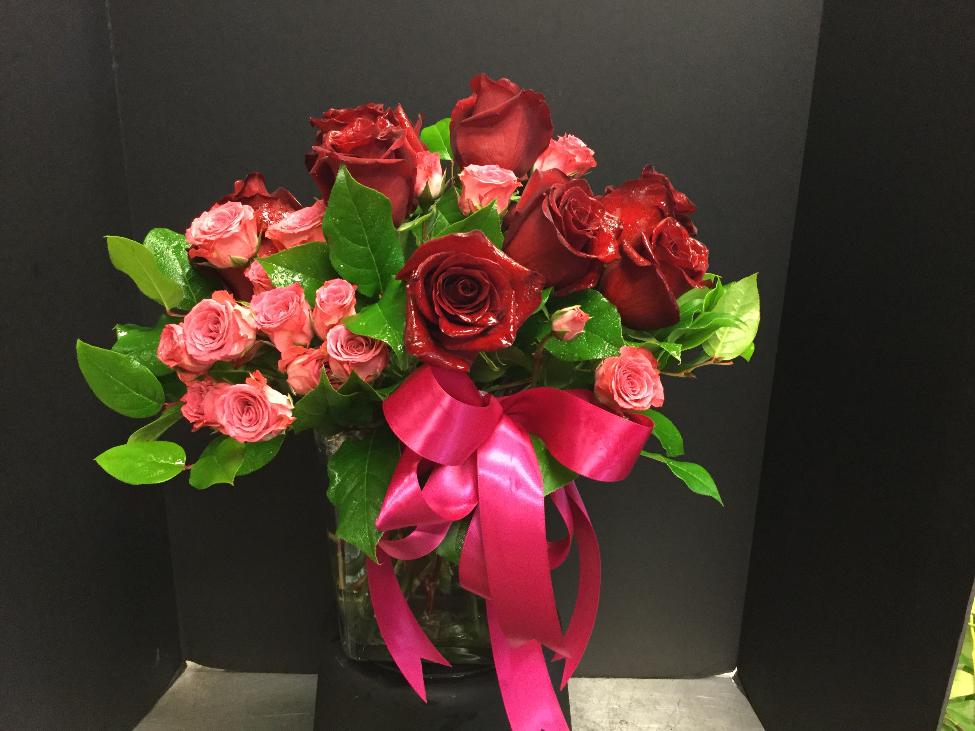 My Sweet Valentine - 1 dozen red roses in a pave style, with pink spray roses for added sweetness!