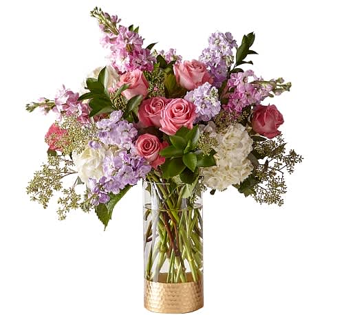 In the Gardens Luxury Bouquet - Take a walk in the gardens with this refined bouquet. Composed of an abundance of pastel florals and elegant texture in one of our signature vases, this arrangement brings natural beauty to anywhere it's placed.
