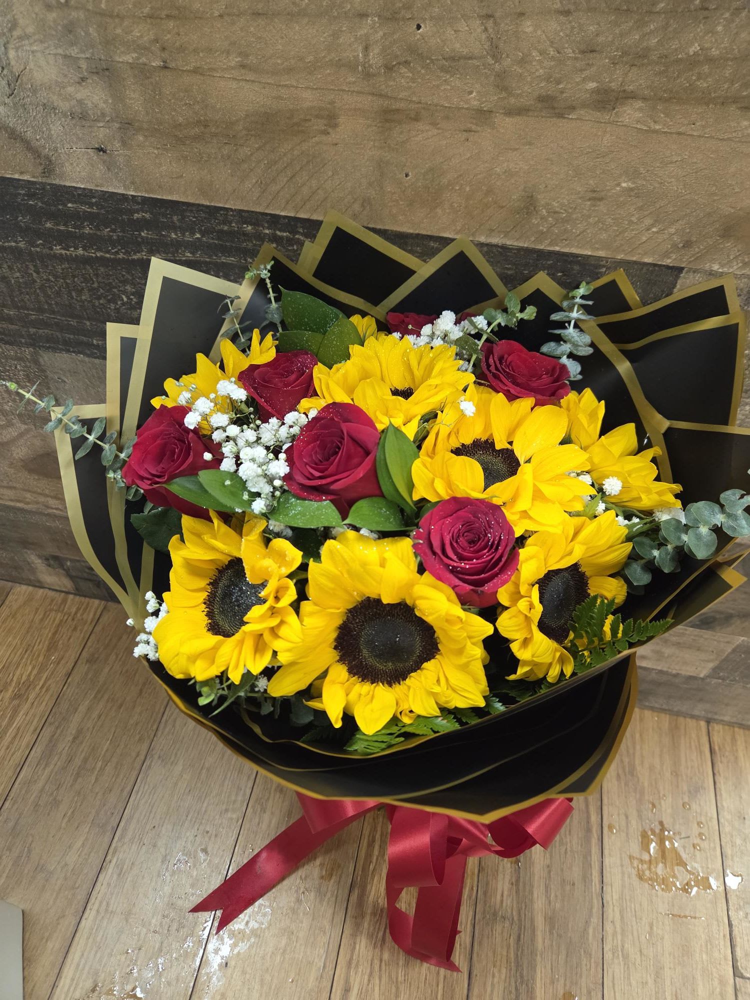 sunflowers and roses bouquet - sunflowers, red roses, babys breath and eucaliptos.