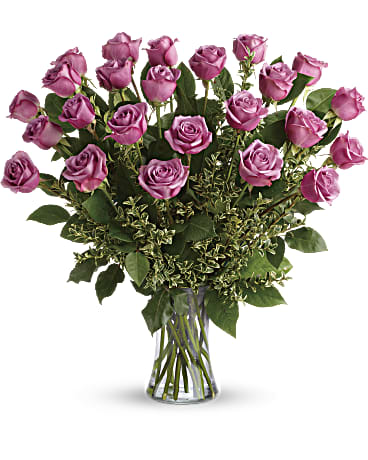 Hey Gorgeous Bouquet - A gorgeous greeting for any occasion, this lovely lavender bouquet features one dozen radiant roses with lush greens in a classic glass vase. 25 roses