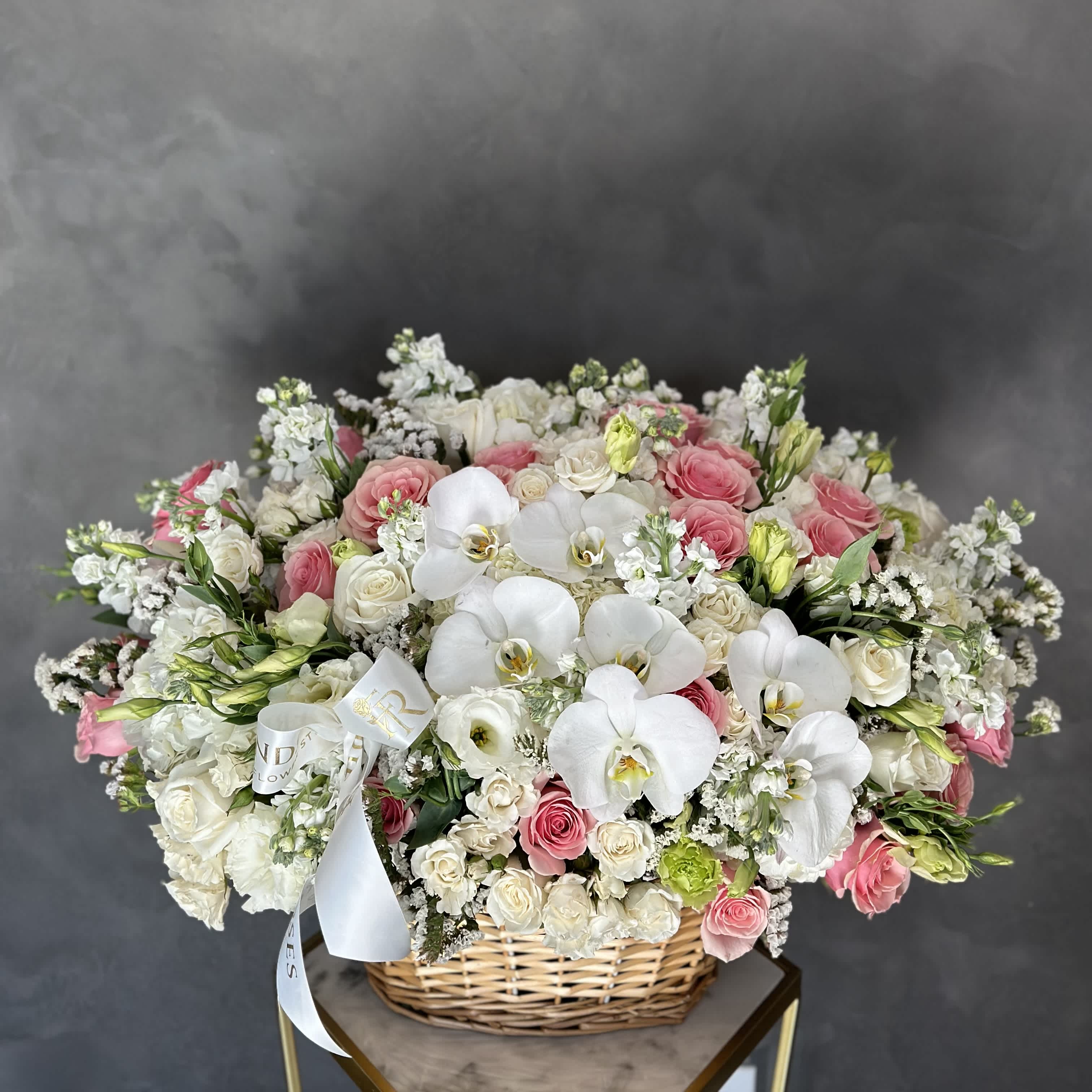 Amelia - This basket is stunning and colorful, filled with high-quality flowers. Masterpiece created by our top florist.
