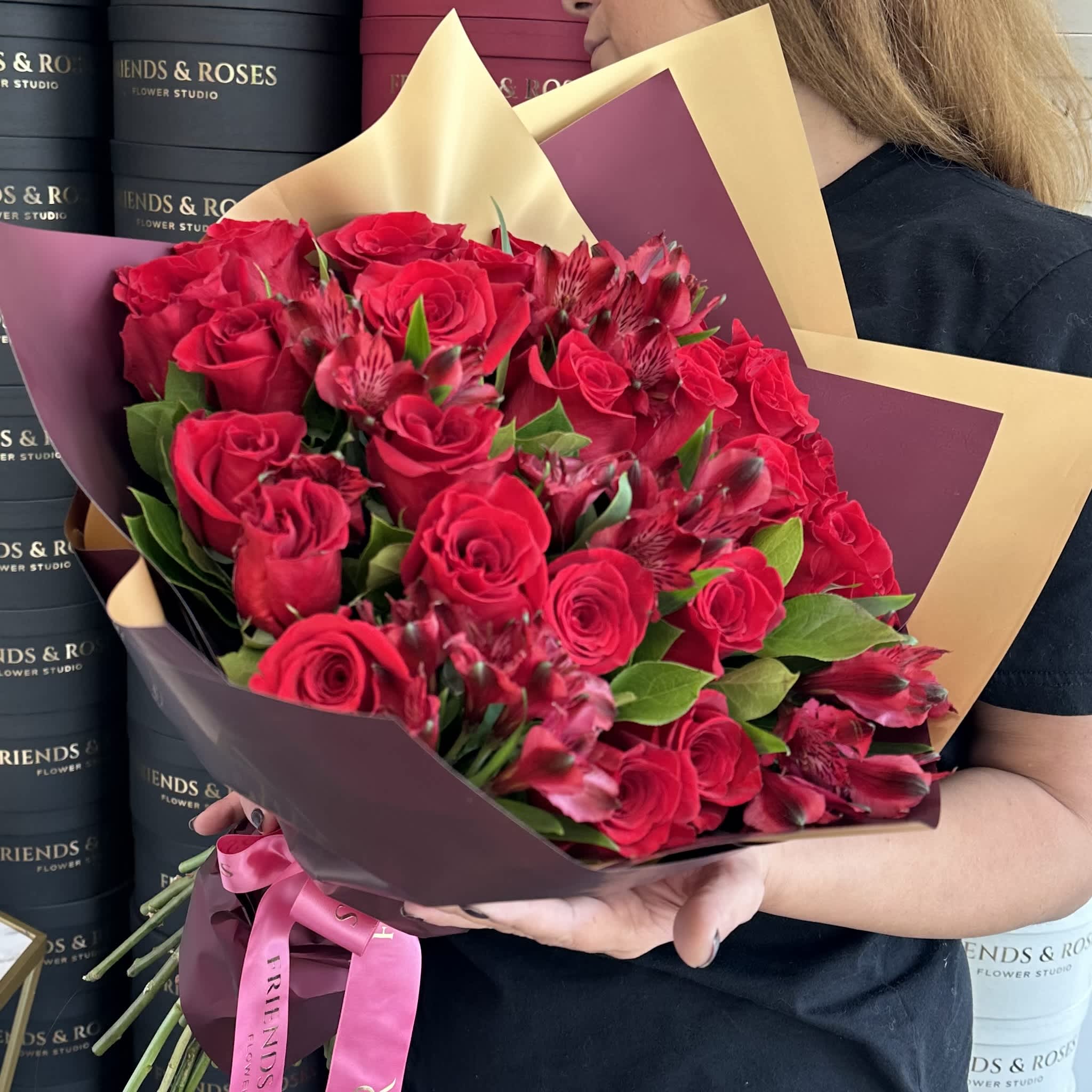 Gabriella - Beautiful fresh-cut red roses and Alstroemerias in a classic bouquet, perfect for any occasion. 
