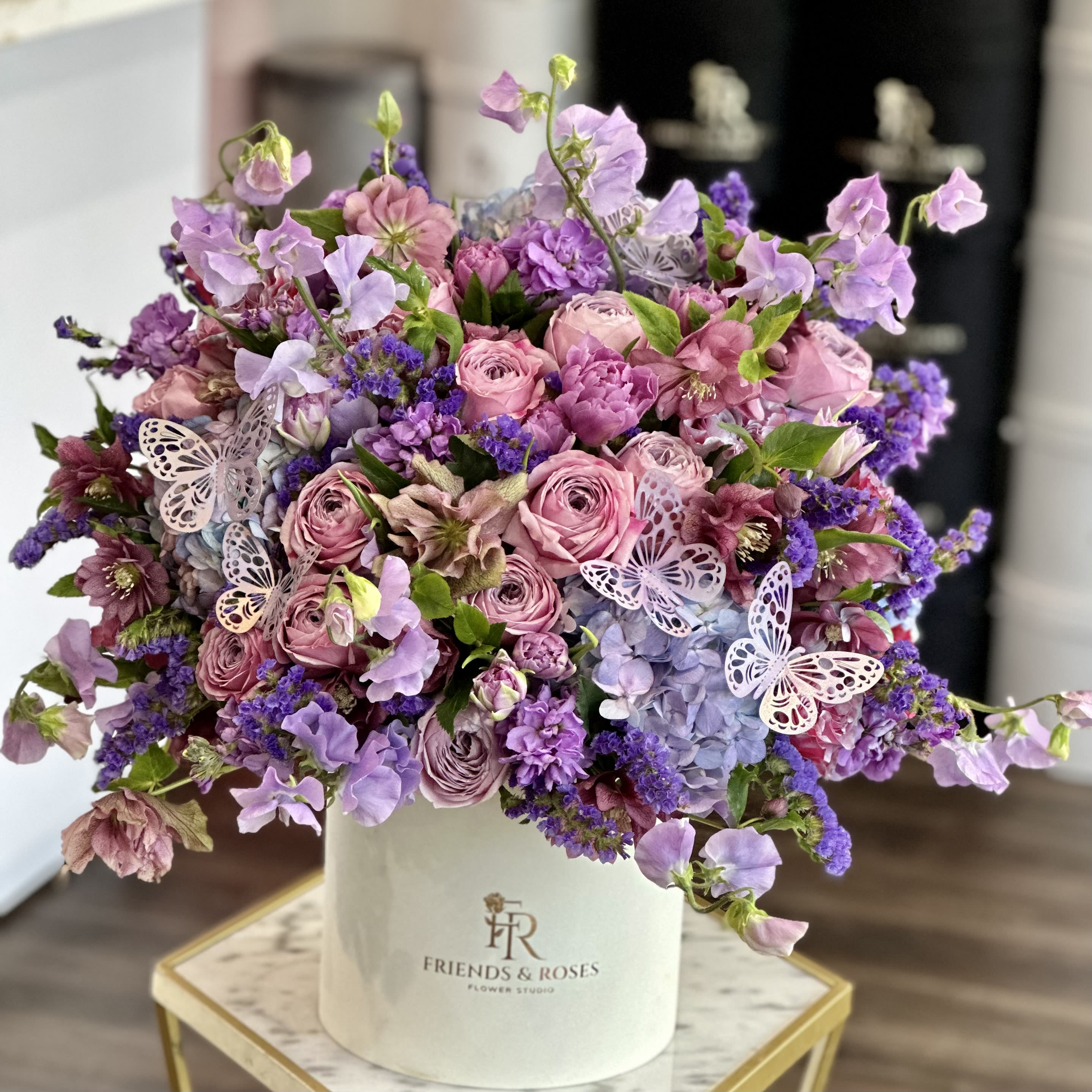 Lilac box - Lilac box is a magical composition of premium lavender and lilac flowers, woven together in a delicate arrangement that radiates enchantment. With soft, soothing hues and a touch of ethereal charm, this bouquet evokes the serene beauty of a fairy's secret garden, capturing the essence of grace and whimsy in every petal. It's a timeless symbol of elegance and mystical allure. 
