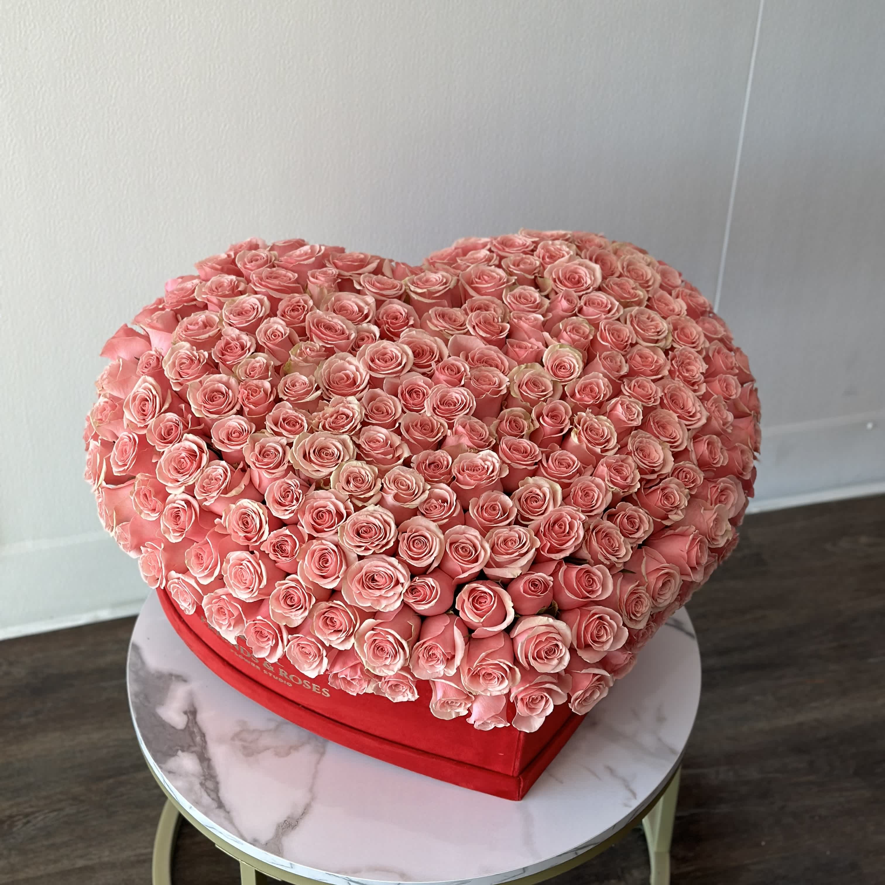 Mi Corazón in Pink  - A magnificent work of art, this enormous heart-shaped box contains 250 freshly cut roses, making it the perfect arrangement for special one.