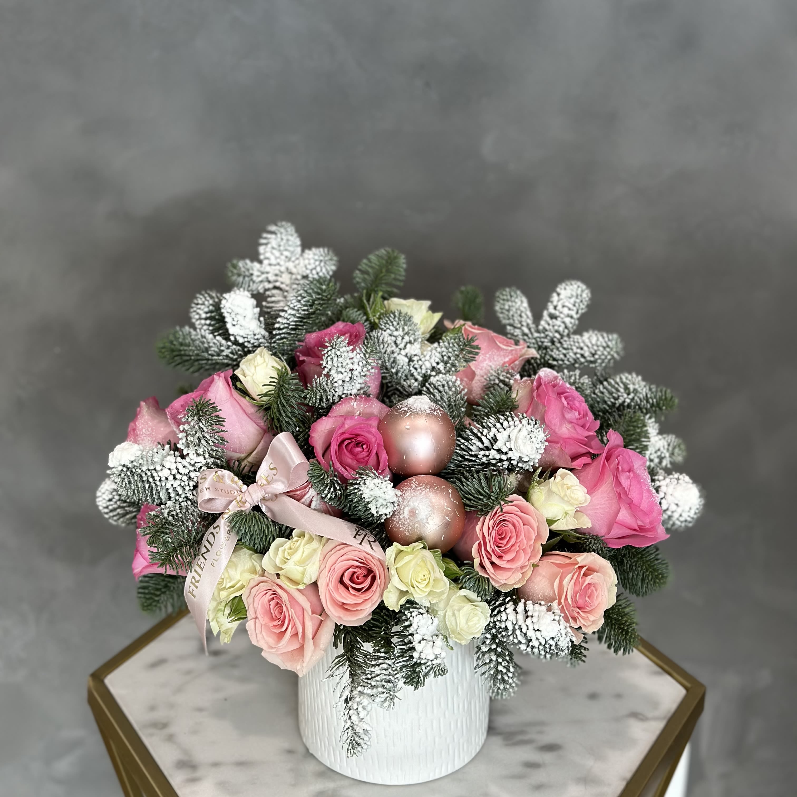 North Pole - A charming holiday vase arrangement makes an ideal holiday gift or home decoration.