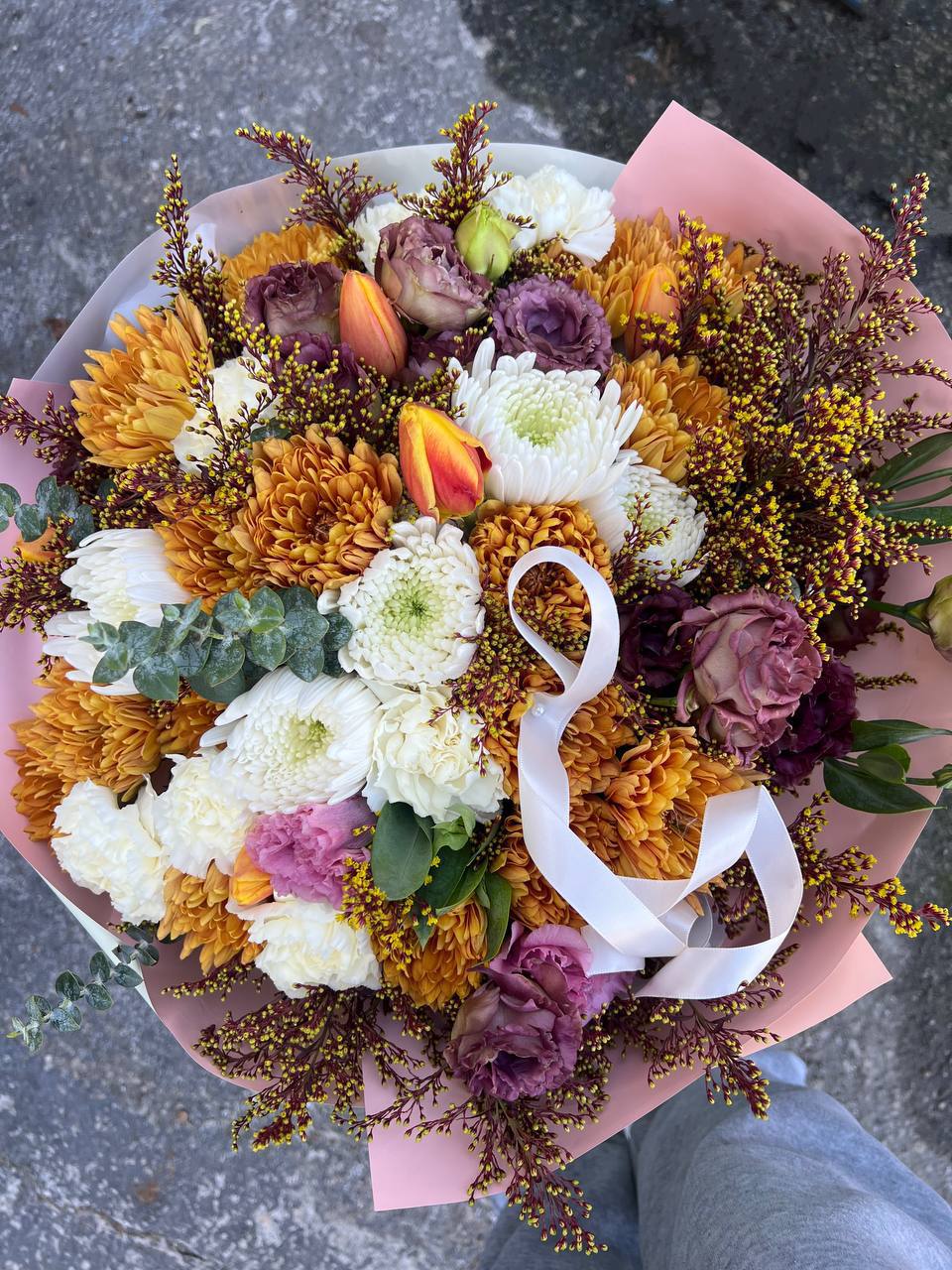 Autumn Whisper  - Autumn Whisper   This bouquet captures the warmth of autumn with its rich golden, creamy, and deep purple tones. A perfect blend of coziness and elegance, it evokes the beauty of sunsets, the scent of spices, and the comfort of a warm embrace. An ideal choice for those who appreciate the charm of the season.