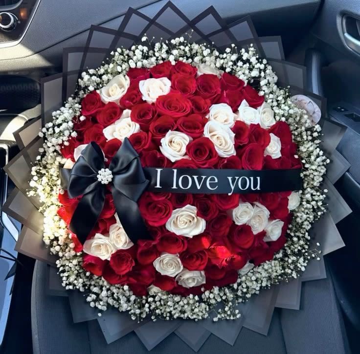 I love you Bouquet - 75 red and white roses with I LOVE YOU ribbon wrapped in Korean paper perfect for your occasion.