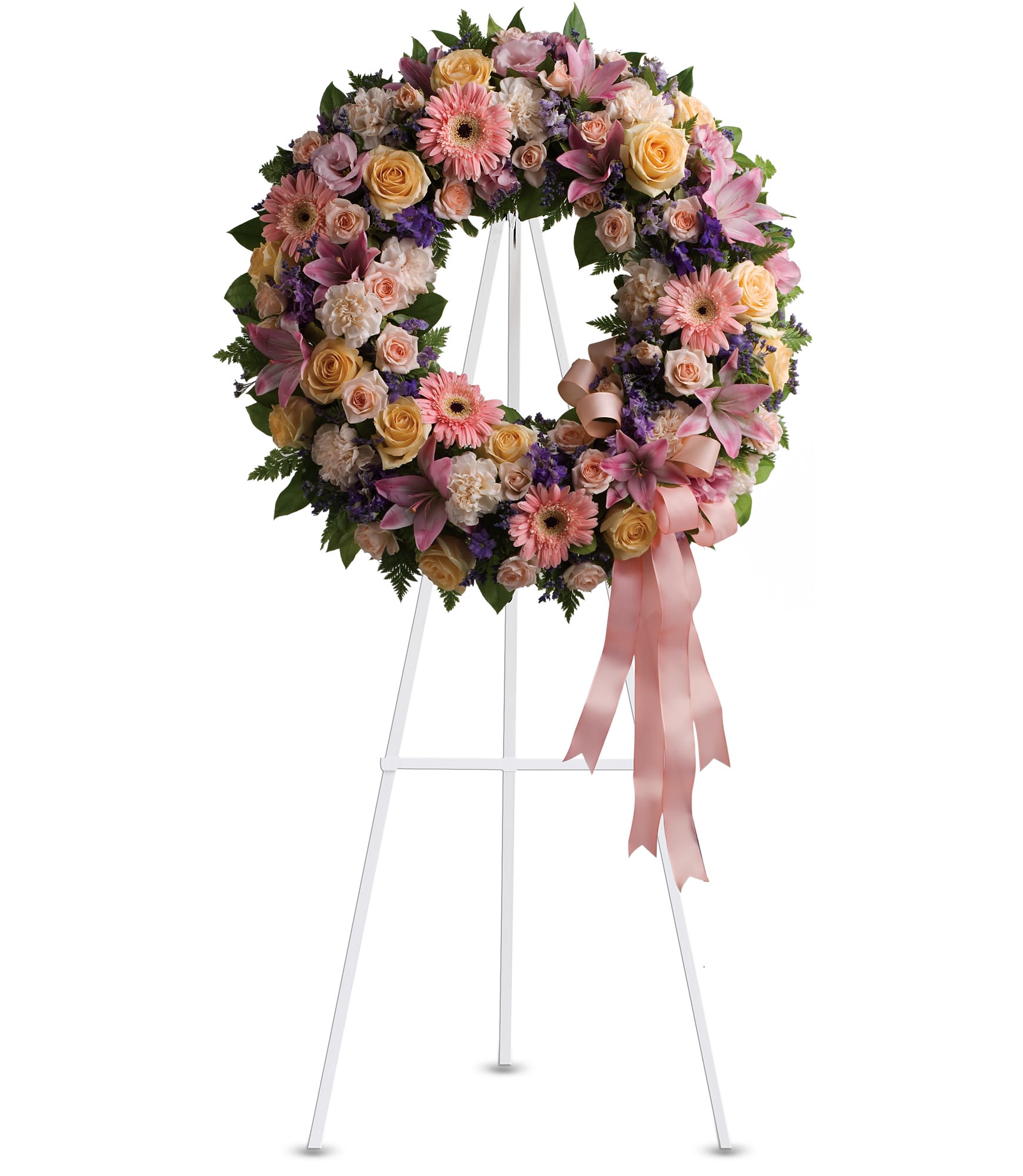 Graceful Wreath by Teleflora - Family and friends will recollect how special their loved one was with this gentle and timeless circle of fragrant blooms to celebrate sweet memories.  