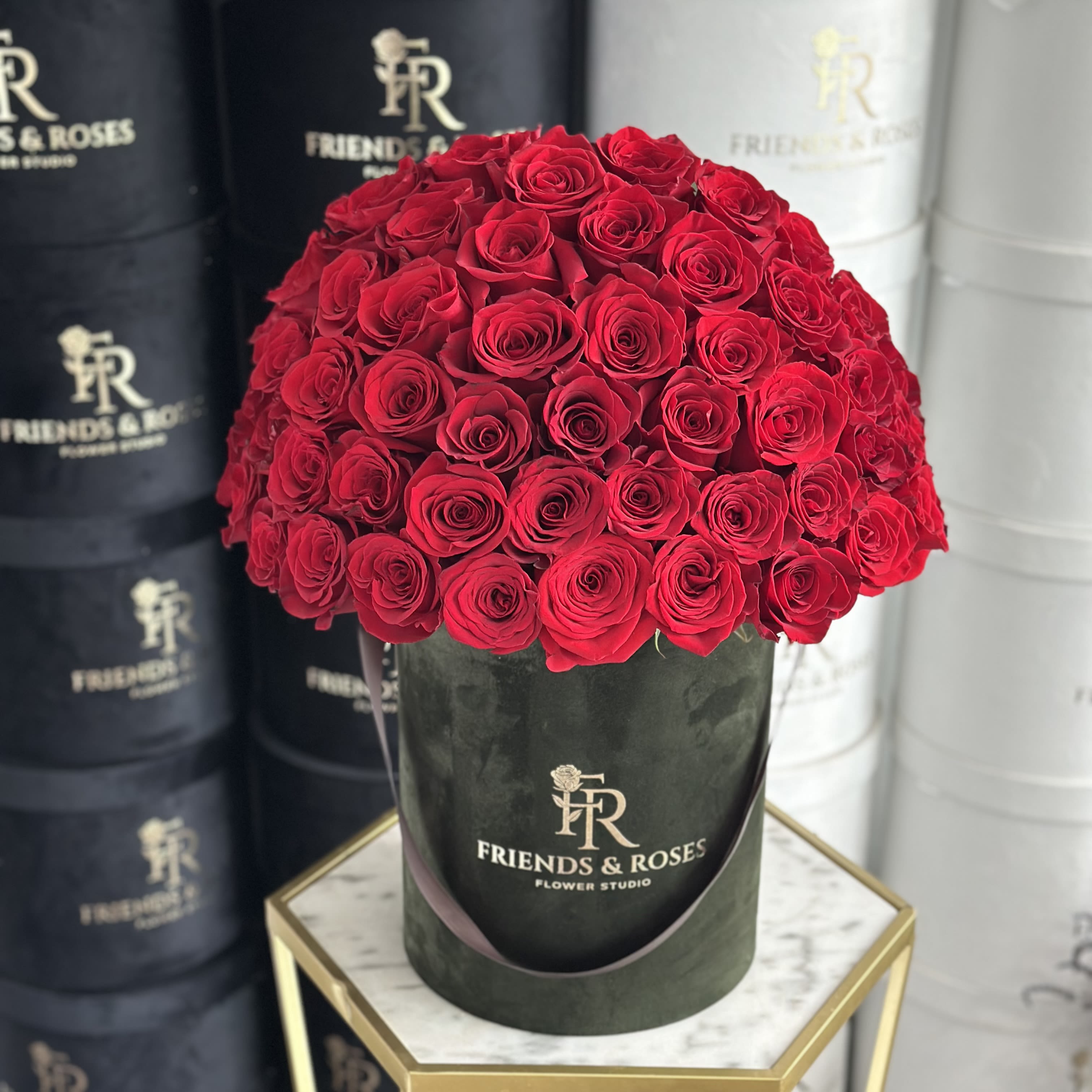 Veronica VD - Beautiful fresh cut roses in our olive signature box. Standard 50 Roses Deluxe 75 Roses Premium 75 Roses and orchid stem