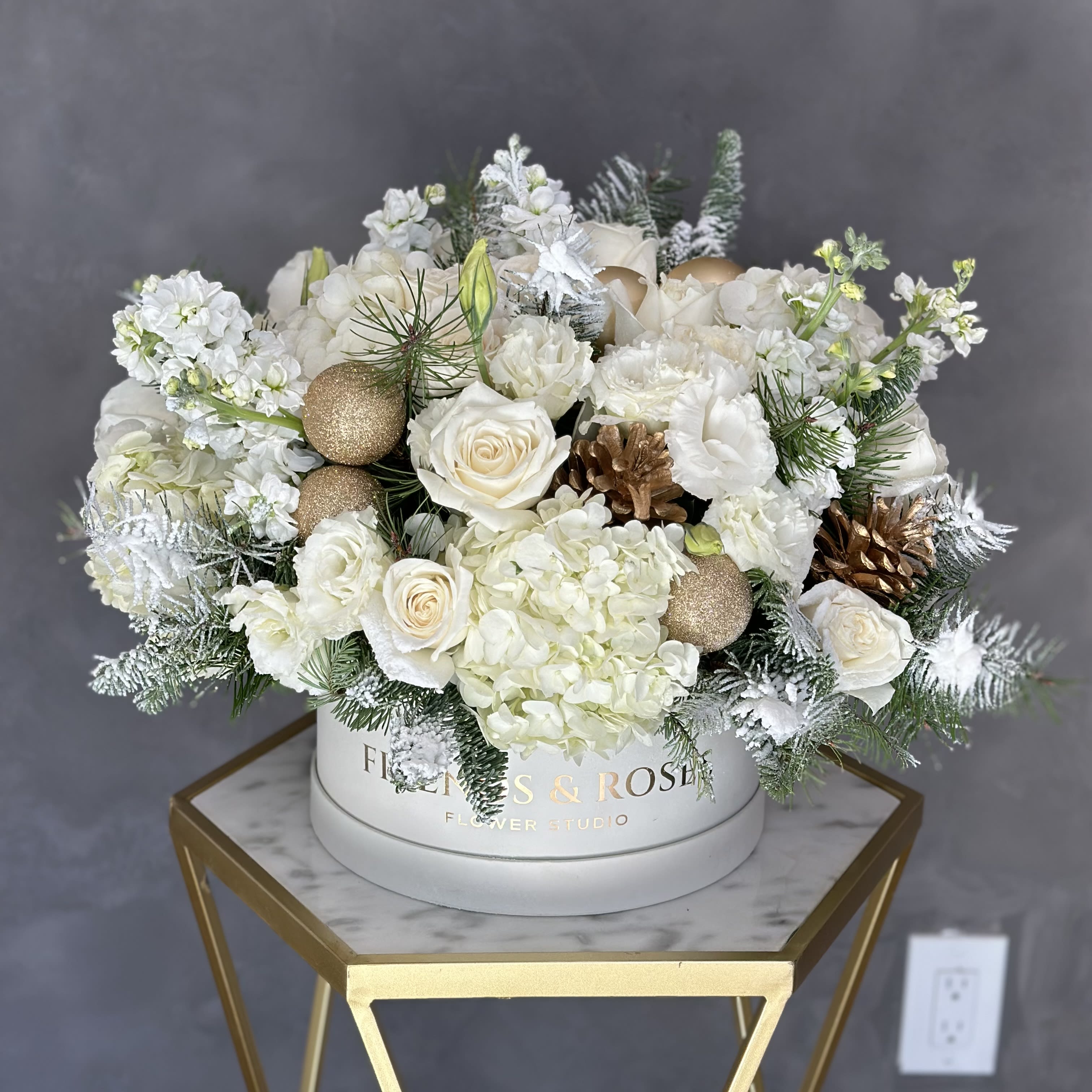 Snowflake - Beautiful Christmas arrangement with fresh flowers, Christmas tree branches, and balls inside our flat ivory box. A truly unique gift for your loved ones or home decor. 