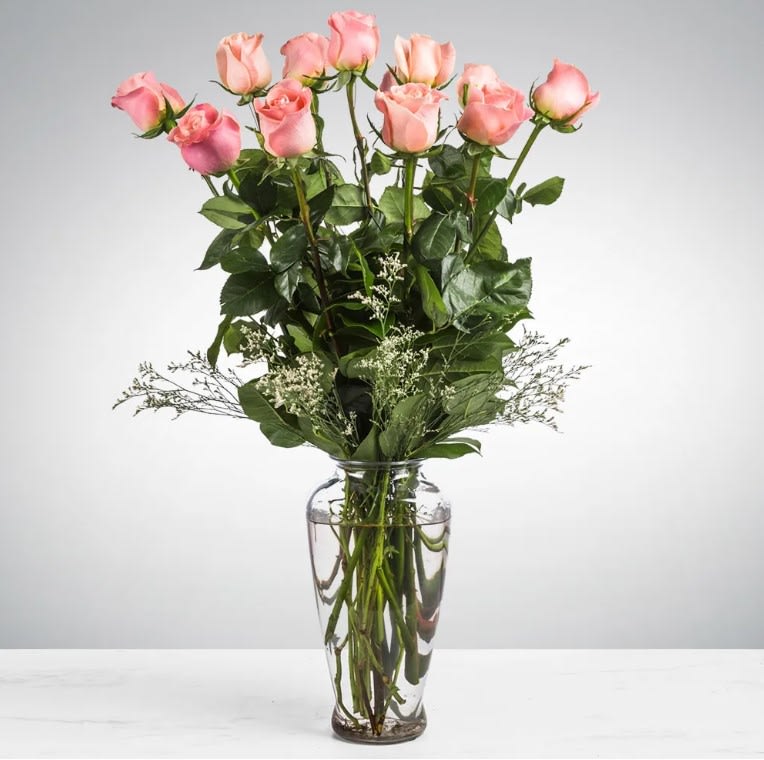 Long Stemmed Pink Roses  - These pink roses are cheerful and fun! Long Stemmed Pink Roses is the perfect gift to show your love and appreciation. 