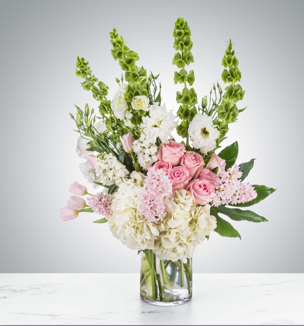 Pink Diamond  - A giant luxury arrangement? Sign us up. Instead of sending standard red roses, send them something soft and pretty and sweet to say "I care".  Approximate Dimensions: 20"D x 30"H