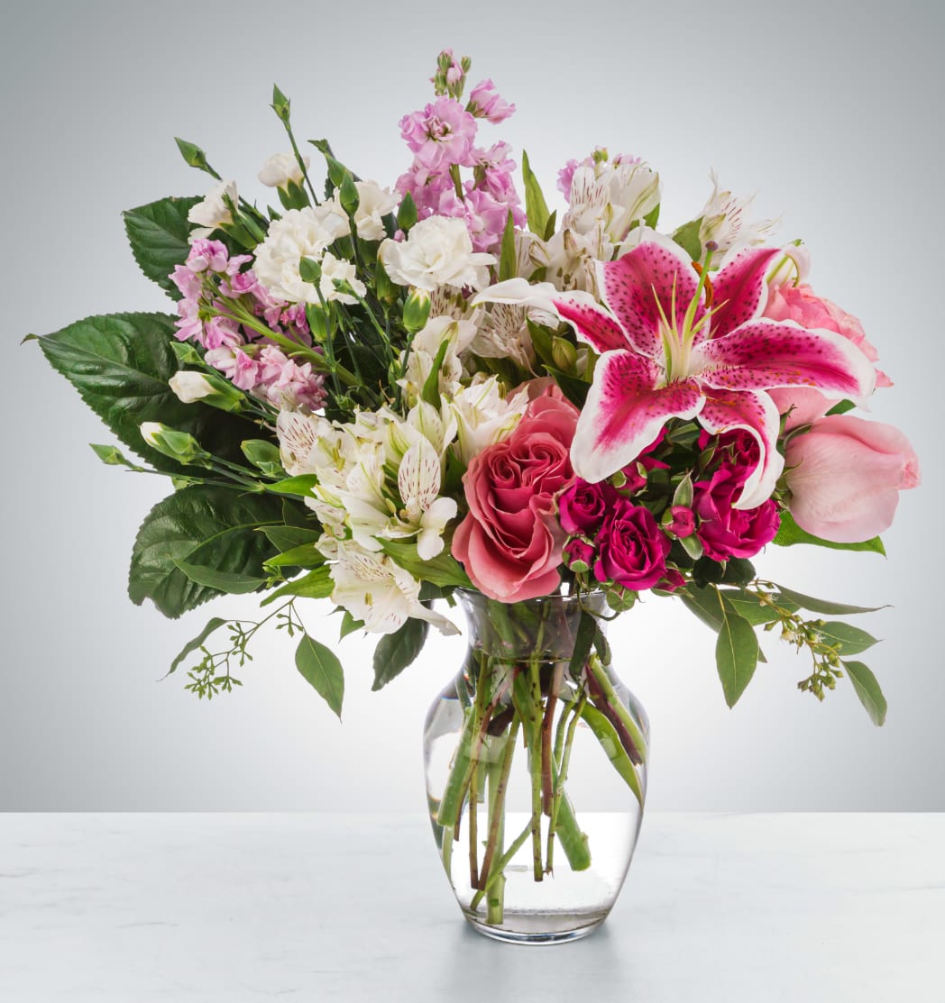 Sweethearts - When they say they don't want anything for Valentine's Day they are LYING. Get them this sweet arrangement to celebrate your love.  Approximate Dimensions: 18"D x 18"H