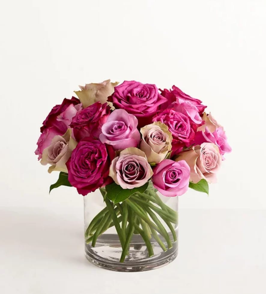 Contemporary Shades of Pink Roses - Refreshing, soothing, and luxurious, the color pink is a welcome grace note in any home or office. And when the hue comes in the form of roses, the effect is even more inviting. This bouquet consists of roses in three glorious shades of pink, arranged by hand in a classic glass cylinder vase to send a message of love and appreciation.