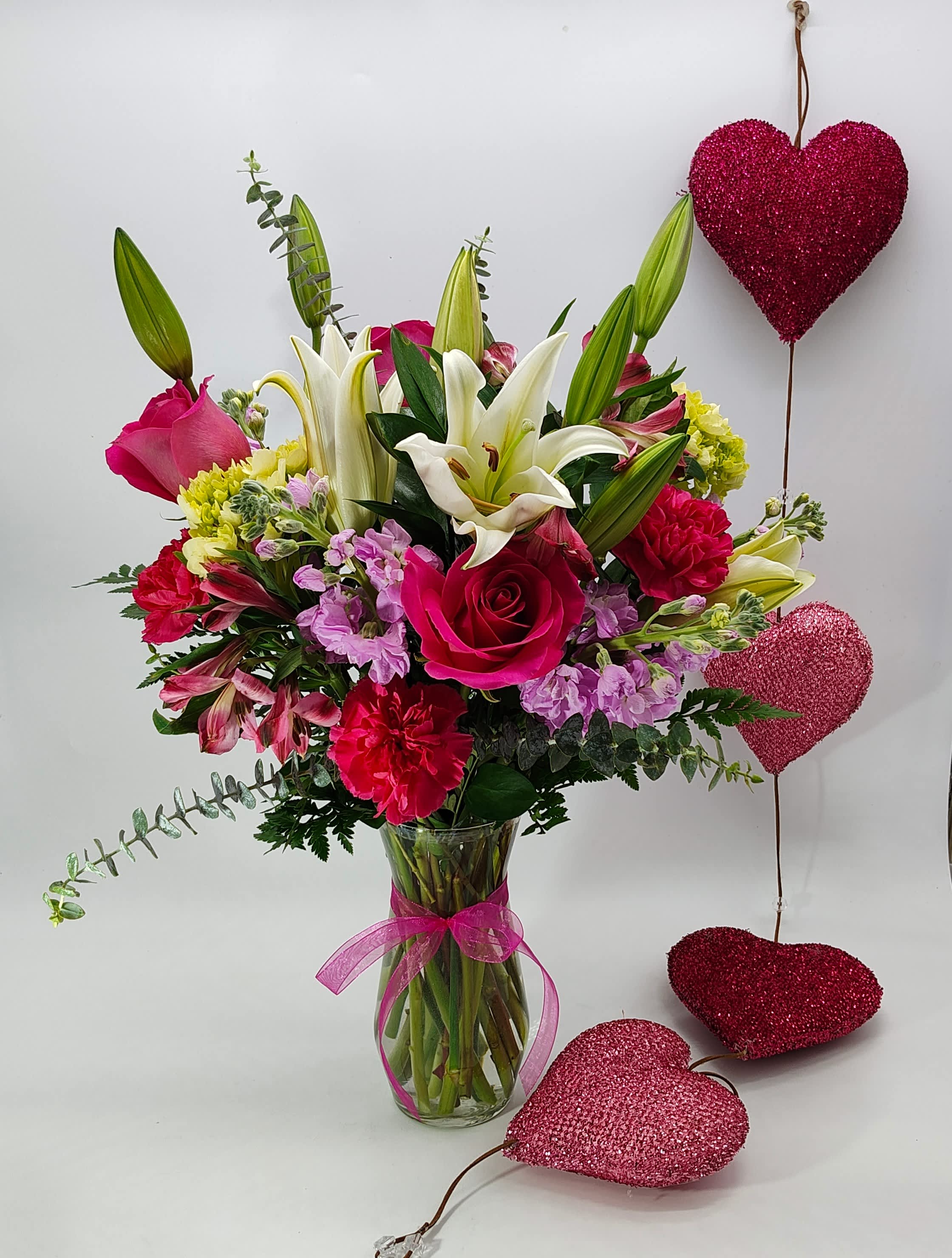 Love You Always - A  mix of hot pink, pink and white flowers. Lots of love packed in here. Approximately 20 inches tall and super long-lasting!