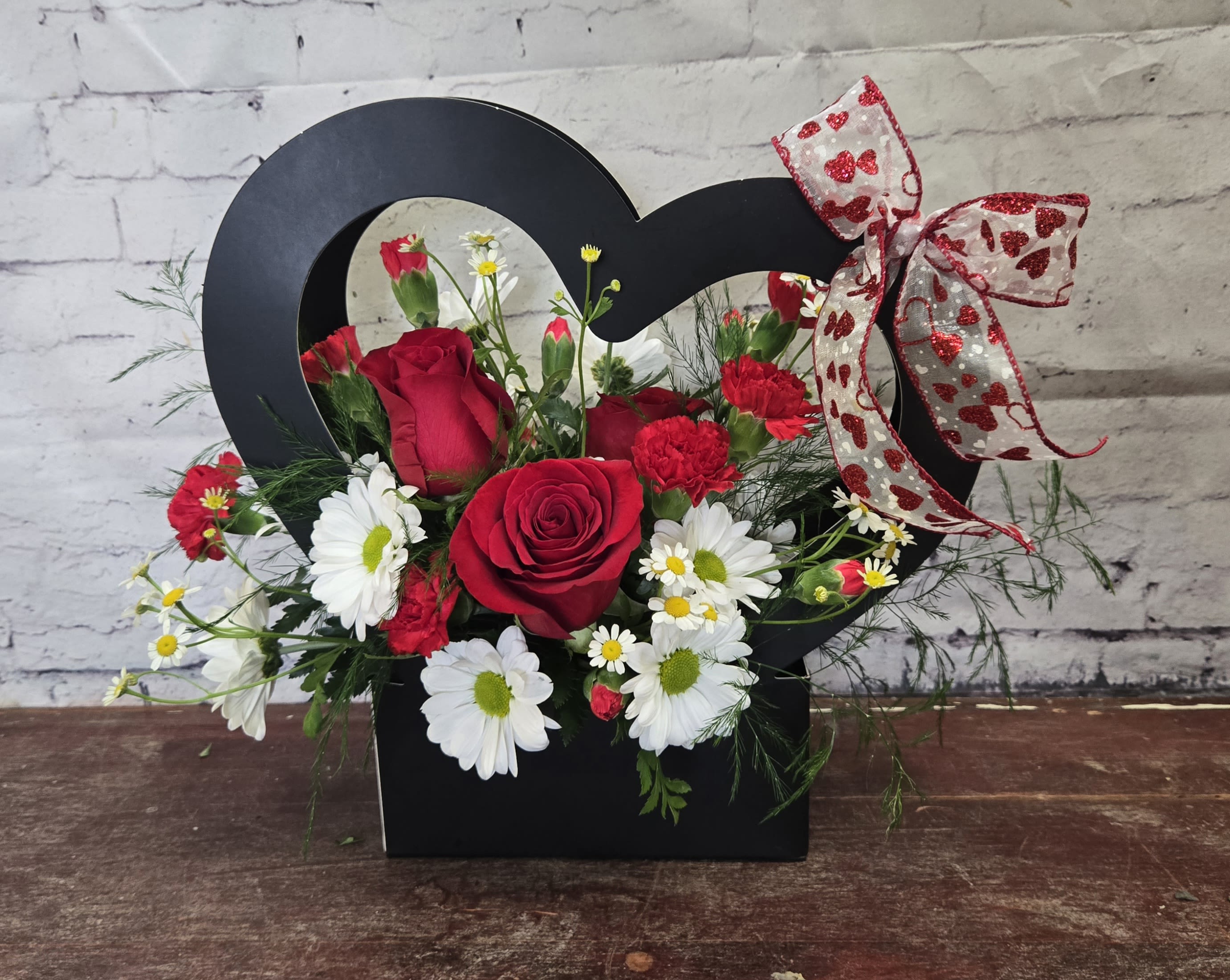 All My Heart  - Red and white flowers in a black heart container 
