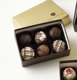 Sweet Shop Chocolate Truffles - Sweet Shop USA makes all natural, handmade chocolate truffles for over 50 years. These are the large 1 1/2 ounce each, chocolate, satisfying truffles!! This box includes six of the larger size of Truffles come in many delicious varieties like the original Fudge Love, Red Velvet, Sea Salt Caramel, Sundae Bash, Peanut Butter and more!!! Truffles come in a beautiful gold box with the Sweet Shop USA logo. Aaa 