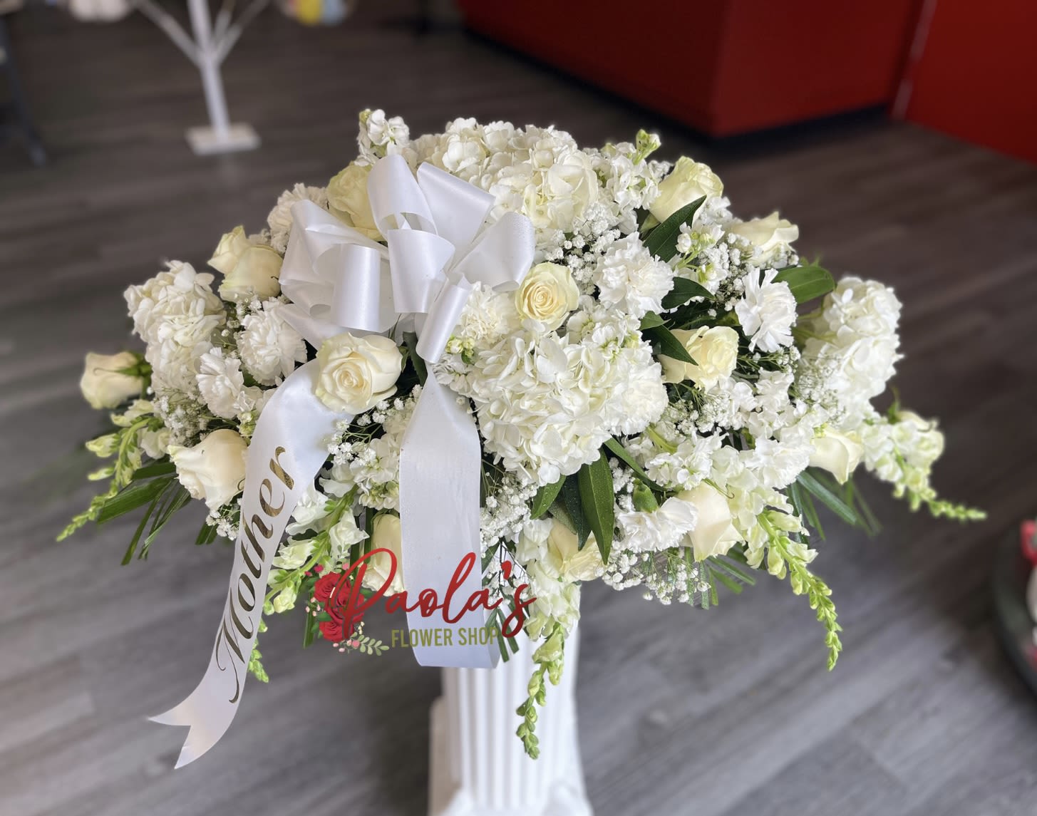 Forever in our heart - Please provide the name that will go on the ribbon 