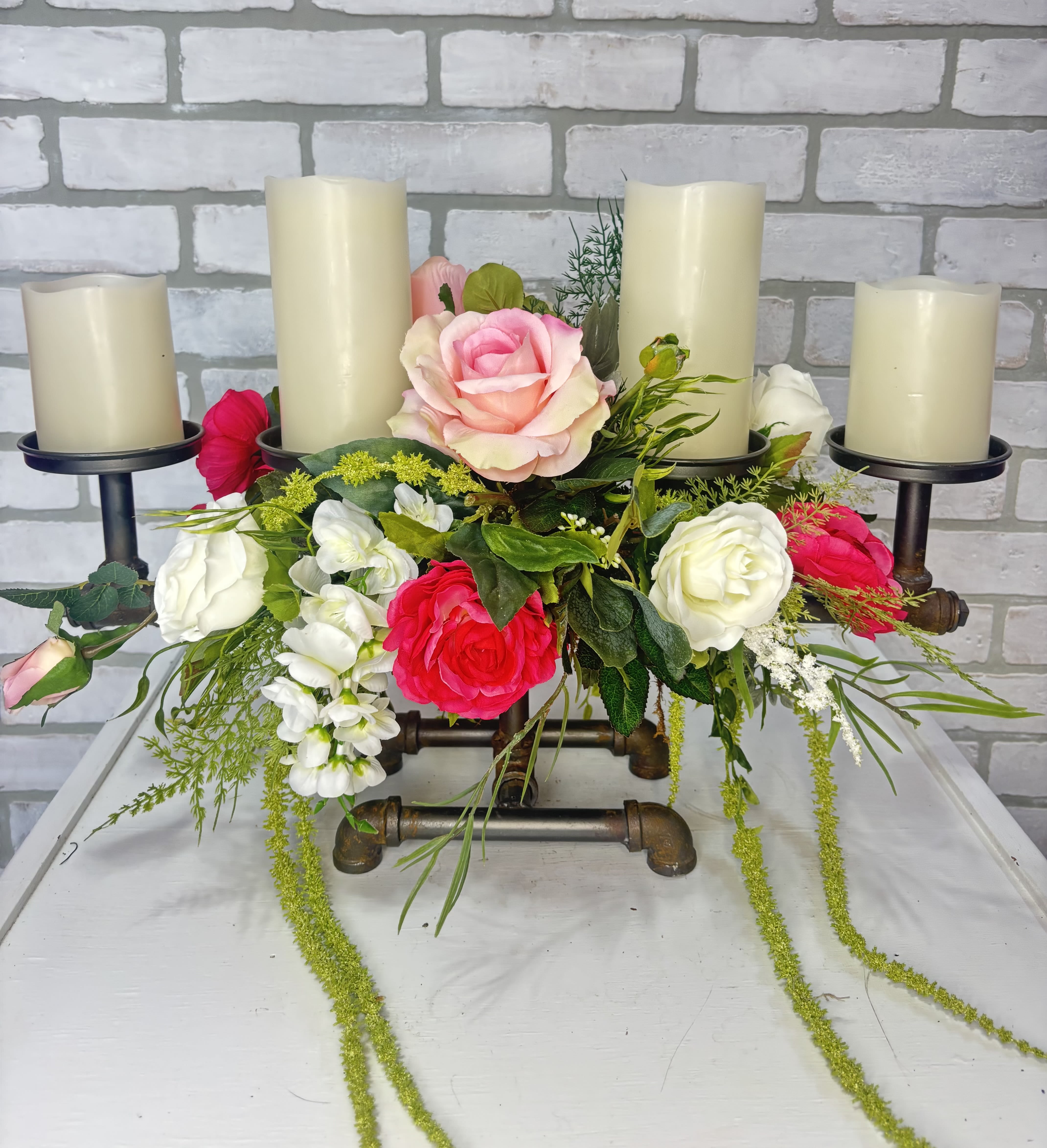 Be Our Guest Silk Centerpiece - Artificial arrangement decorating a candelabra, candles included.