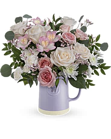 Blossom Delight Bouquet - Gift Mom timeless elegance with our Teleflora's Sweetest Flutter pitcher. This food-safe ceramic pitcher is adorned with an embossed butterfly and a soothing lavender finish, making it the perfect complement to a vibrant Mother's Day bouquet.