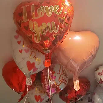 Valentine's Day Balloon - Add a Beautiful 12 inch heart shaped hellium balloon to your order.