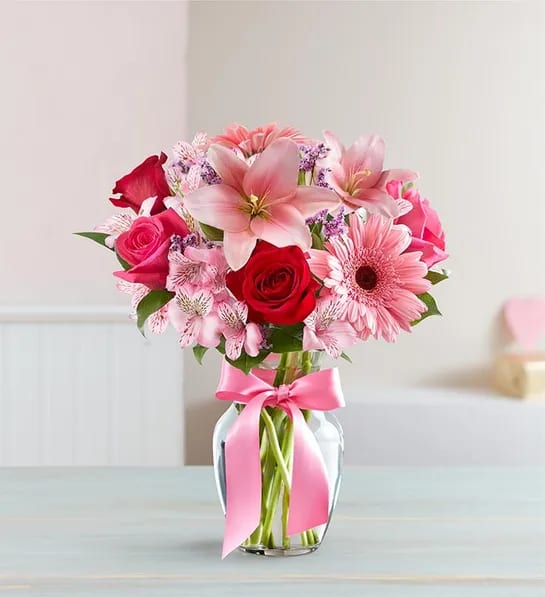 Fields of Europe Romance - Inspired by the rich beauty of the European countryside, our romantic bouquet reveals all the feelings you have in your heart. Fresh-picked pink &amp; red blooms are on display inside a glass vase finished with ribbon, creating a timeless gift for someone you love. **VASE WILL VARY**
