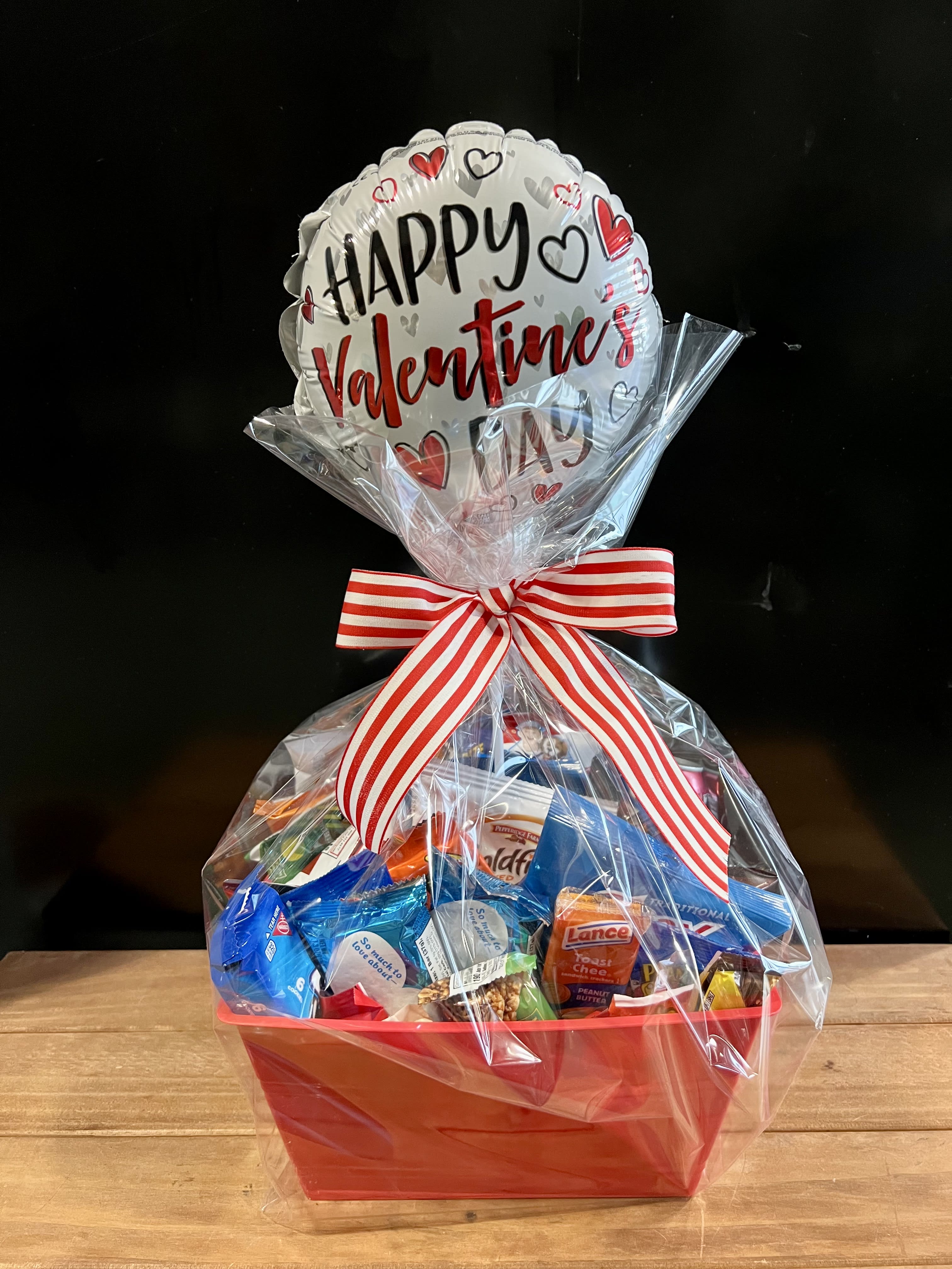 Valentine Snack Basket - The perfect gift for any snack lover- a tub full of assorted sweet &amp; salty snacks and a Valentine air-filled balloon. Chips, cookies, crackers, candy &amp; MORE! 