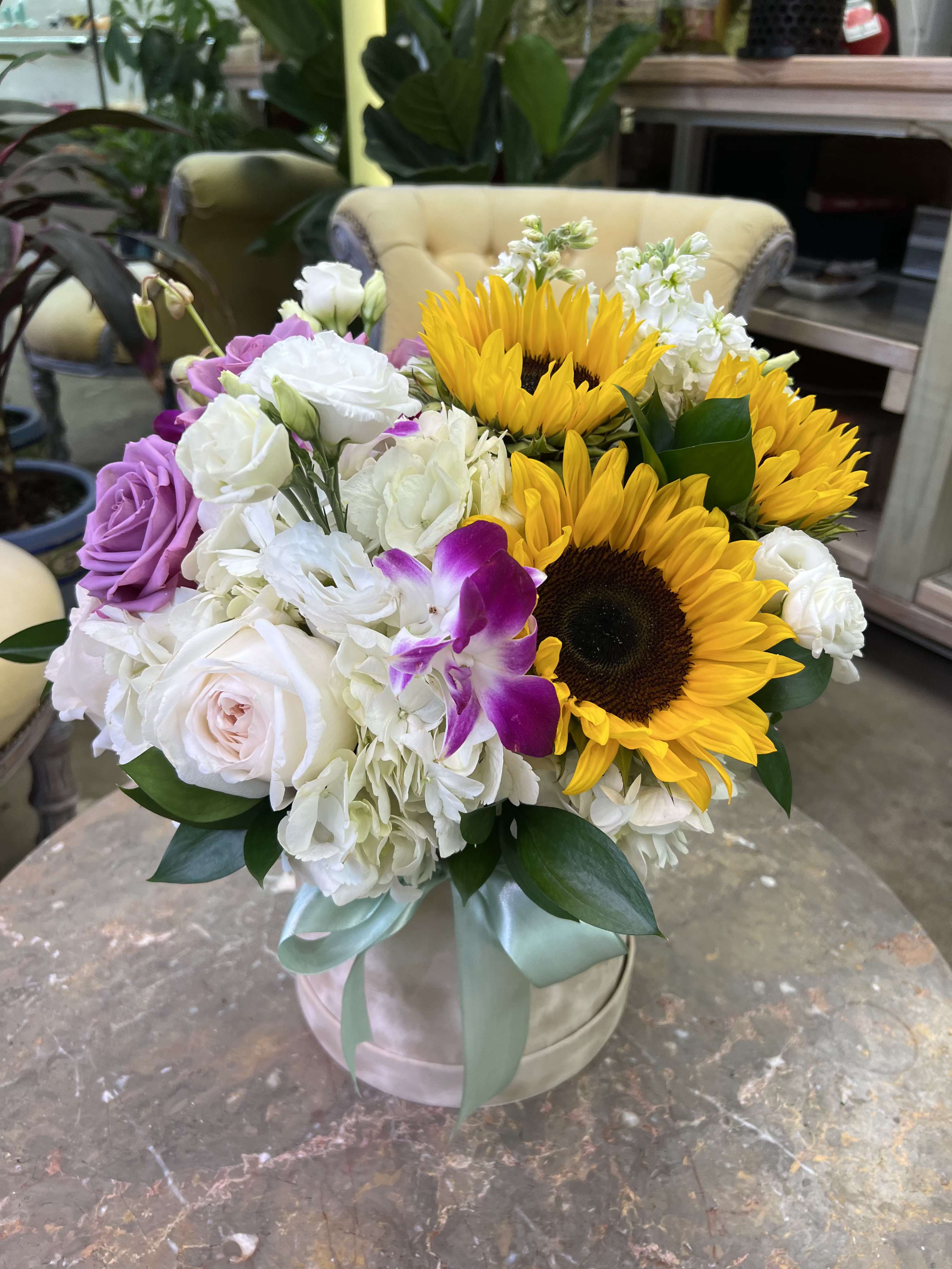 Sunlit Box  - Sunflowers, roses, and orchids-because happiness should come in every color. 