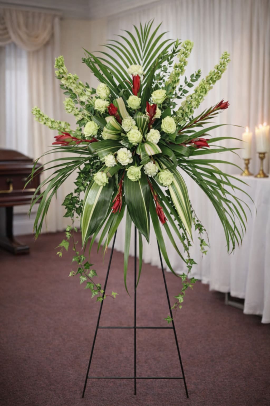 Final Flight Standing Spray  - A beautiful standing spray arrangement with assorted flowers and lush greenery, created as a tribute for a solemn occasion.   A unique arrangement hand created by our experienced designers. Please note that every design is custom made and substitution to container and flower types may happen from time to time. Design aspects will always stay the same, but if needed, we will substitute with flowers of equal or greater value to offer you a great floral shopping experience! Our flowers are 100% guaranteed. Please call us with any questions or concerns.