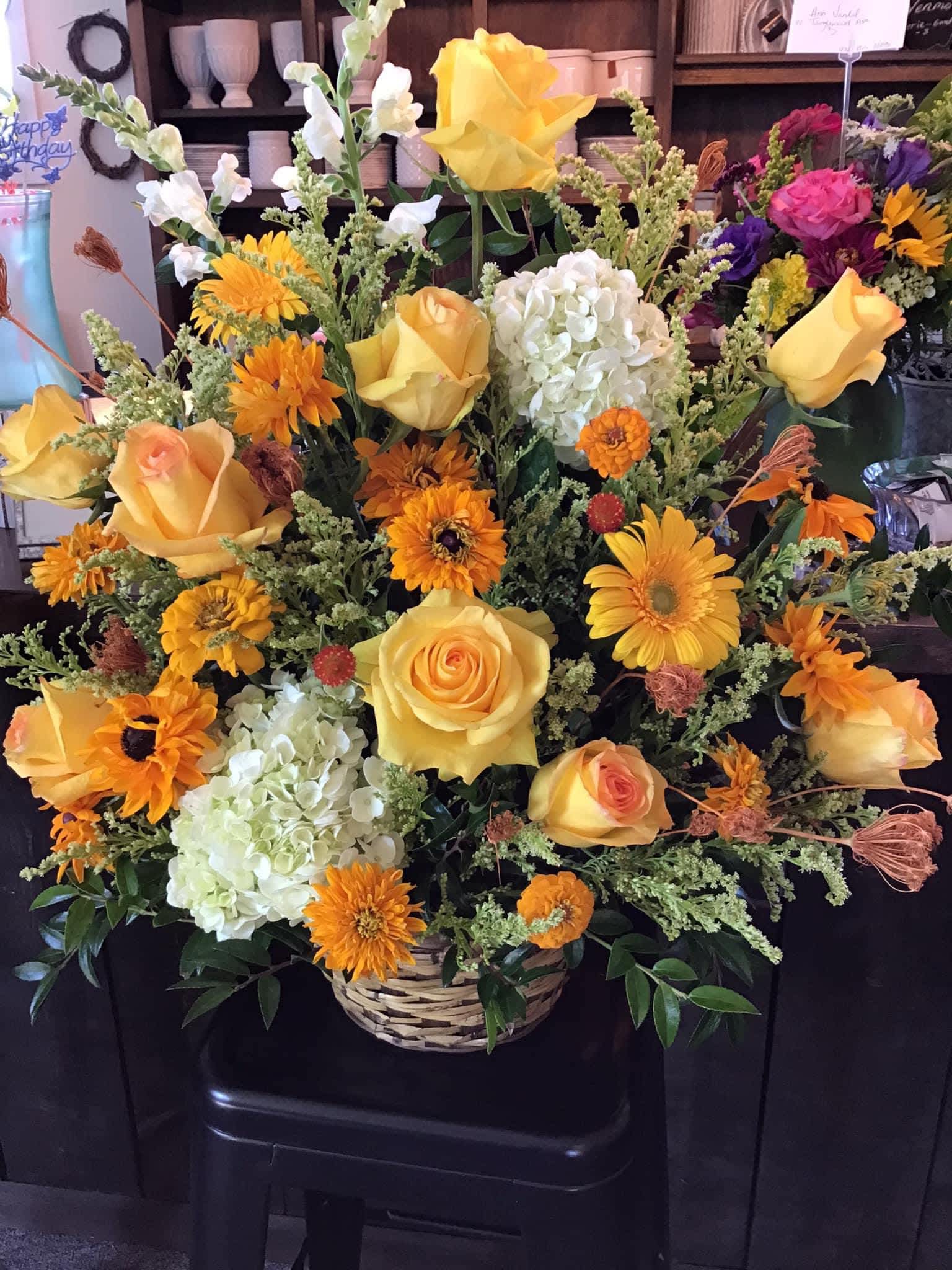 Yellow Roses &amp; mixed flowers basket - Traditional sympathy basket filled with a mix of yellow &amp; white, featuring yellow roses.