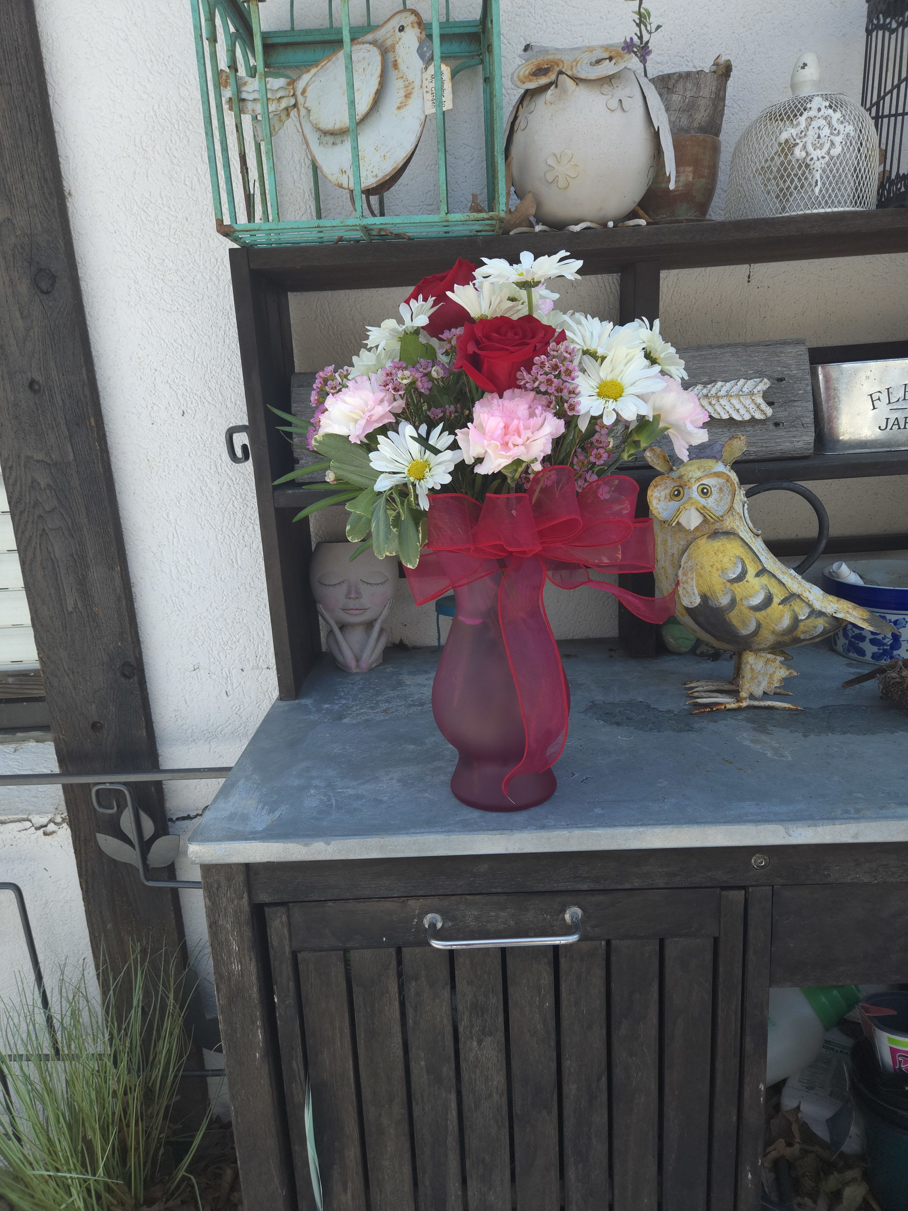 Just a little something for you - Just a little something for you to brighten your day. roses, daisies and carnations  and wax flowers.