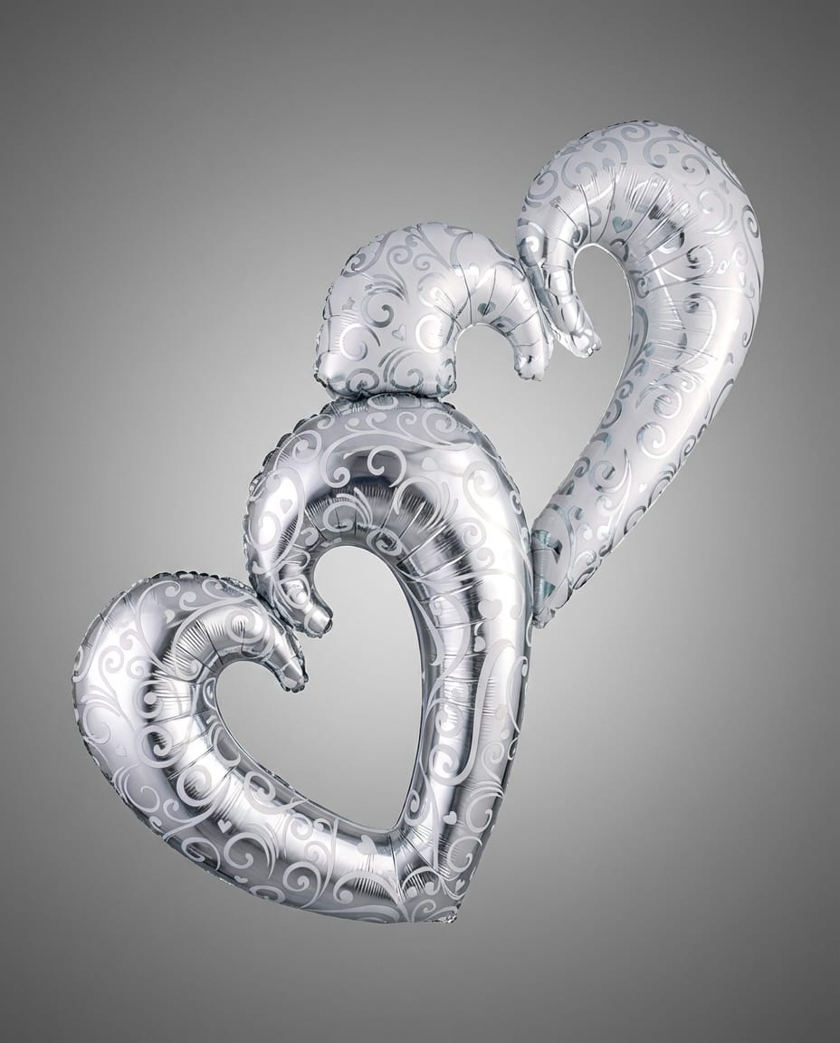 Interlocking Hearts 36" x 53" - Decorate your party space in style with this charming interlocking hearts balloon. This large silver balloon is a perfect party decoration for a bridal shower, wedding reception or Valentine’s Day party. This balloon also makes a big statement as a sweet Valentine’s Day gift. 36" x 53"