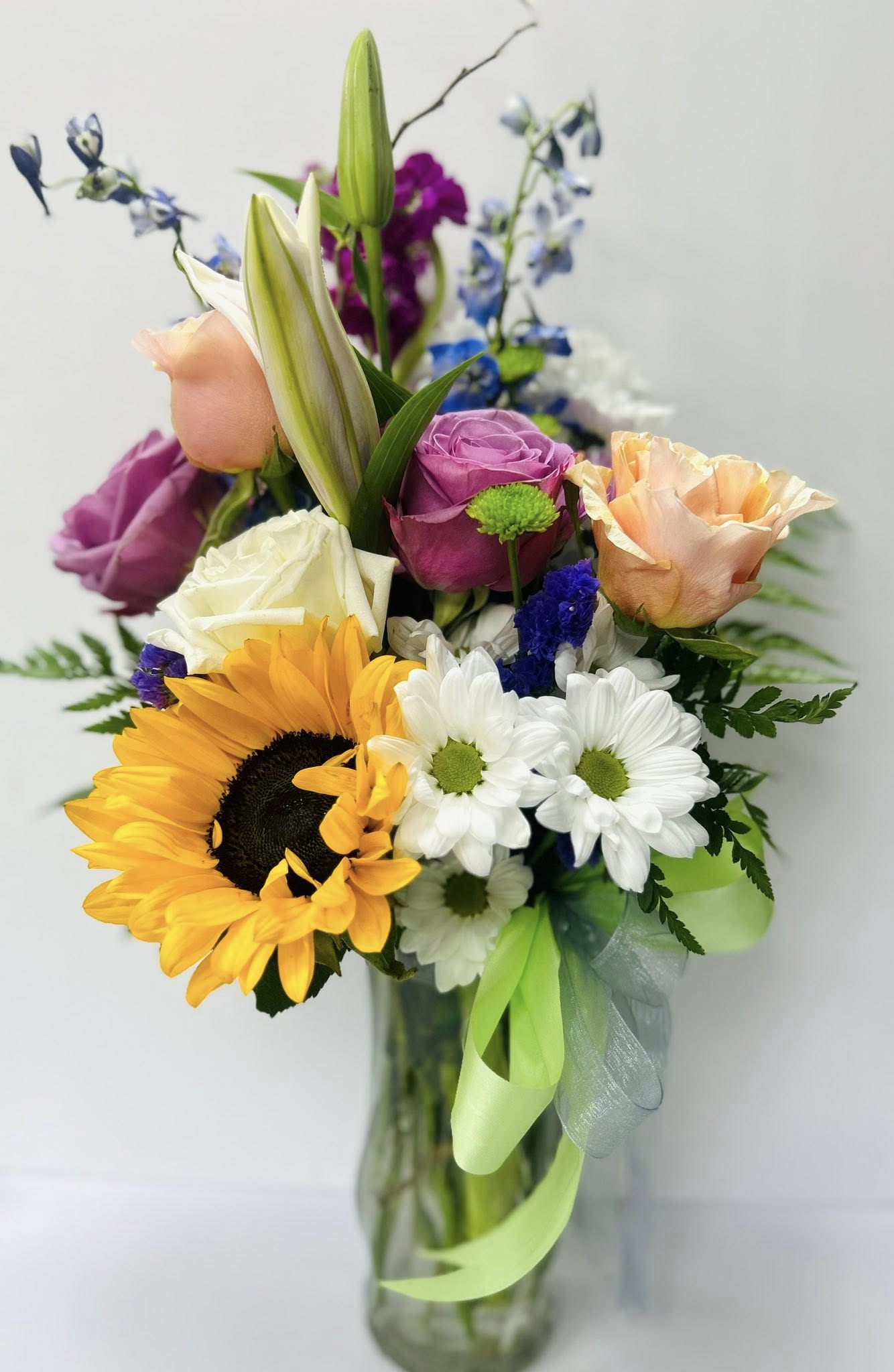 Sunny &amp; Vibrant - A mix of colorful roses, sunflowers, poms, and greenery, perfect for any everyday occasion.