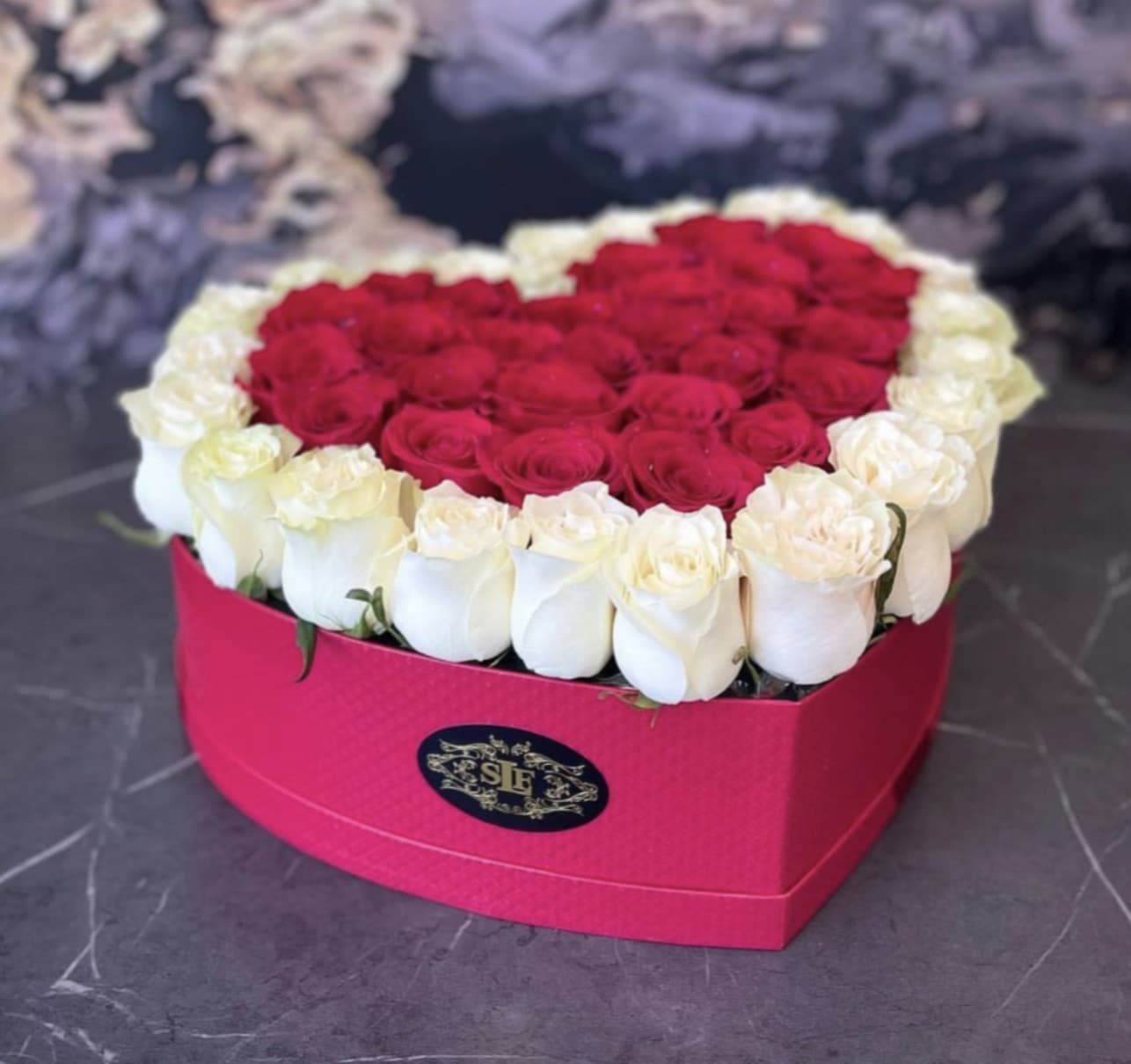 Dreamy rose  - Brighten any space with our Elegant Flower Box Arrangement! Bursting with vibrant blooms, this stunning display combines seasonal favorites with lush fillers.   Housed in a chic, reusable container, it makes a perfect centerpiece for any occasion be it a gift or a treat for yourself. Elevate your decor with this captivating arrangement that brings joy and sophistication to your home or office. Order yours today and let the beauty of flowers inspire you! 