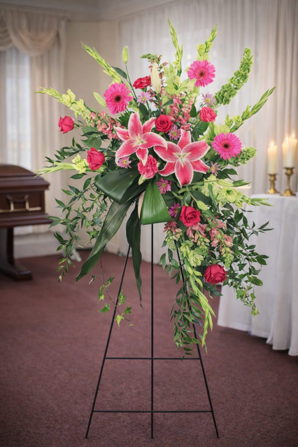 Grateful Heart Standing Spray  - A beautiful standing spray of pink flowers, a symbol of love and remembrance.   A unique arrangement hand created by our experienced designers. Please note that every design is custom made and substitution to container and flower types may happen from time to time. Design aspects will always stay the same, but if needed, we will substitute with flowers of equal or greater value to offer you a great floral shopping experience! Our flowers are 100% guaranteed. Please call us with any questions or concerns.