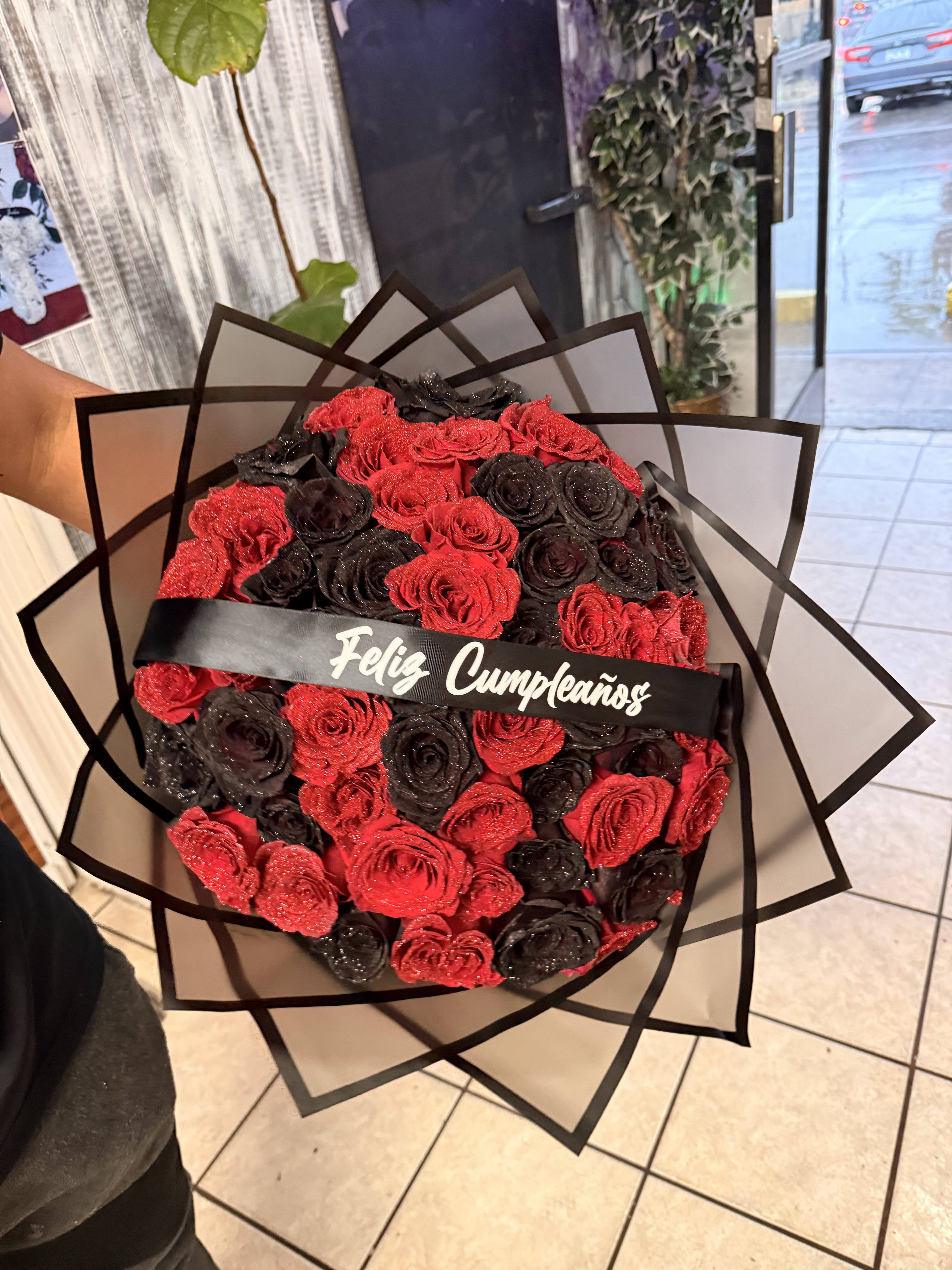 Red and black glitter ramo - 50 count glitter red &amp; black rose ramo with black translucent wrap bouquet with personalized ribbon (Enter your custom ribbon text in the "Order Notes" section) Bouquet will be delivered approximately as pictured.