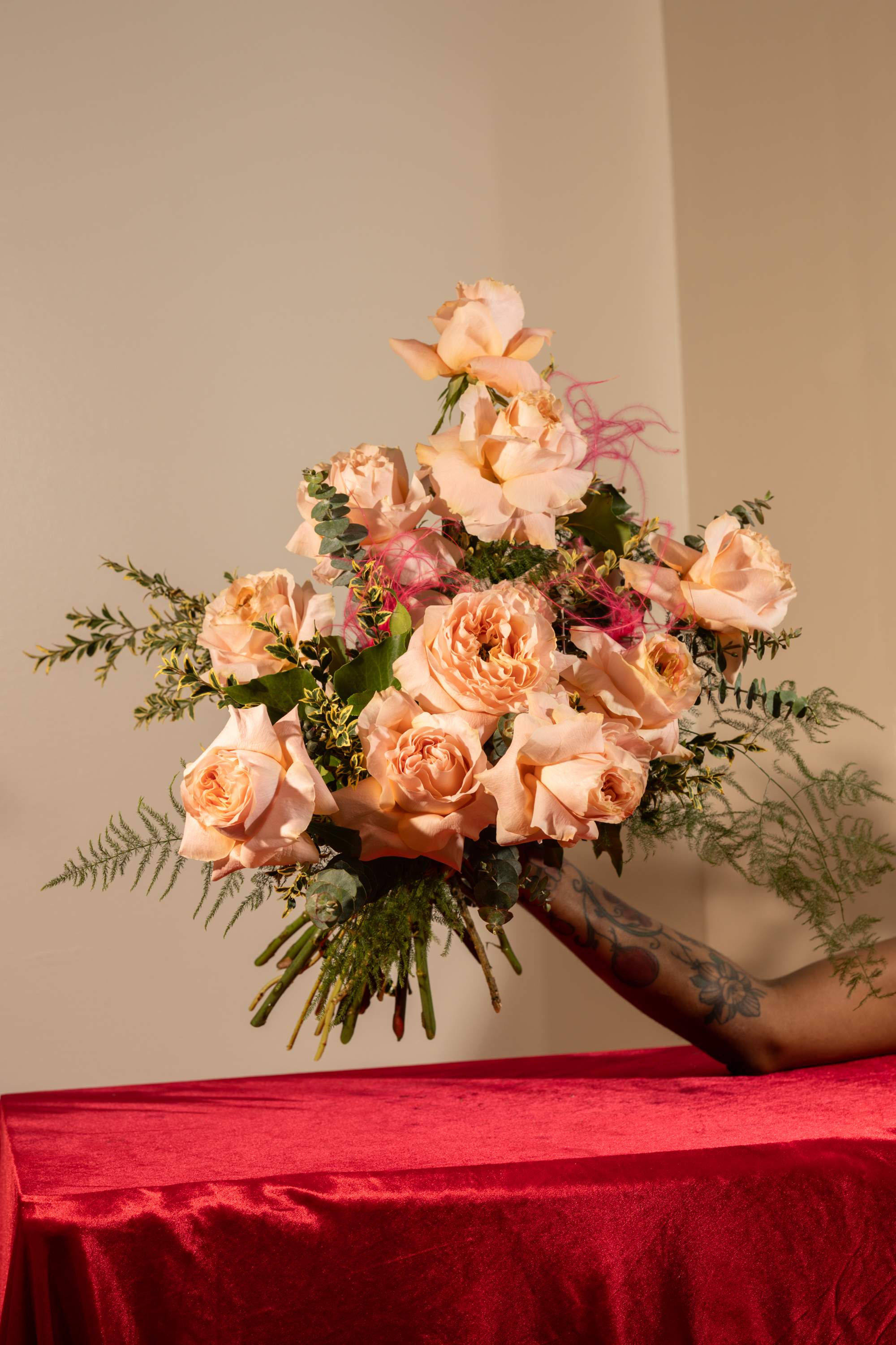 The Bakers Dozen Rose Bouquet  - Gift them with our classic "Baker's Dozen" Bouquet created with 13 of our best roses! Choose from three varities or mix them: Black Pearl, Matilda, and Princess Crown.   ***Please let us know in the"Florist Notes" your rose preference otherwise we will choose at our decrection. 