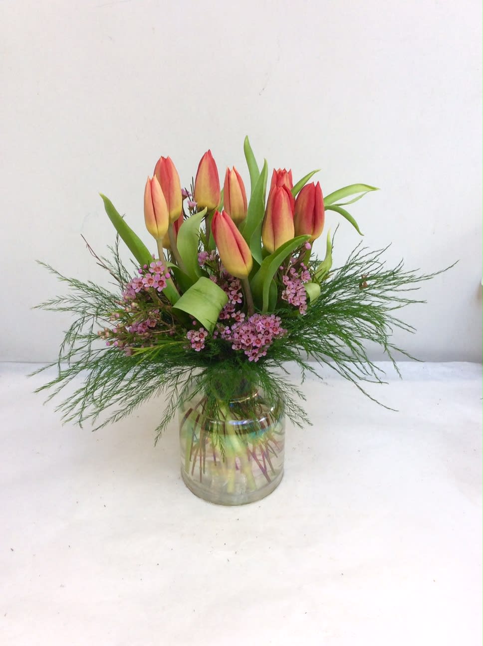 Terrific Tulips - Vase arrangement of spring tulips in a pretty iridescent vase. 