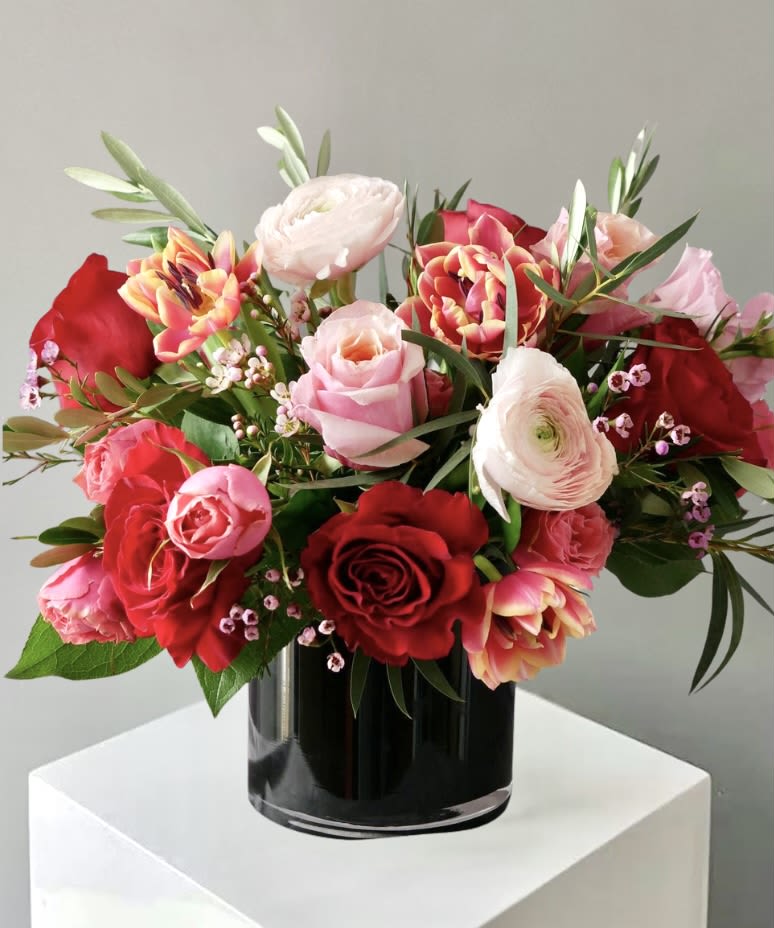 Timeless Love - This exquisite floral arrangement is thoughtfully handcrafted using fresh, high-quality blooms selected for their beauty, texture, and seasonal appeal. A harmonious blend of flowers and lush greenery creates depth and movement, resulting in a design that feels both elegant and natural. Each stem is carefully placed to highlight the unique character of the blooms while maintaining a balanced and visually striking composition.