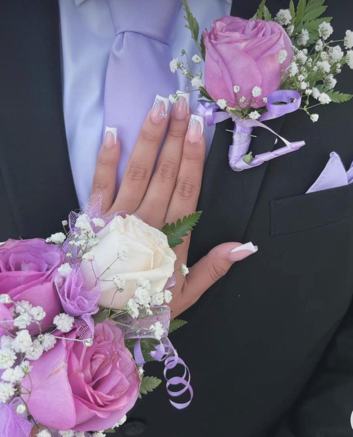 lavender corsage and boutonniere - A classic light purple corsage and boutonnière that compliments any suit. A perfect addition for any prom, formal, or wedding event  boutonnière that compliments any suit.